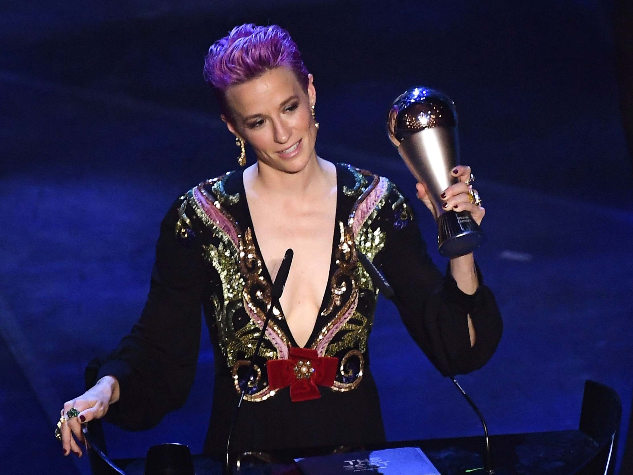 Megan Rapinoe collects her award in Milan