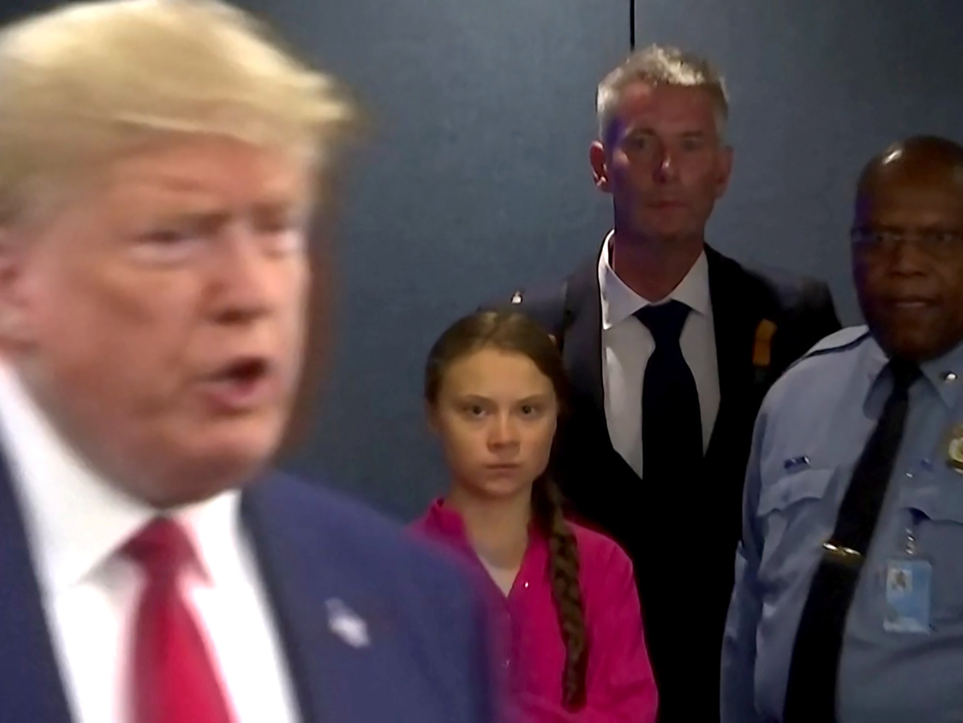 Greta Thunberg watches Donald Trump speak to reporters