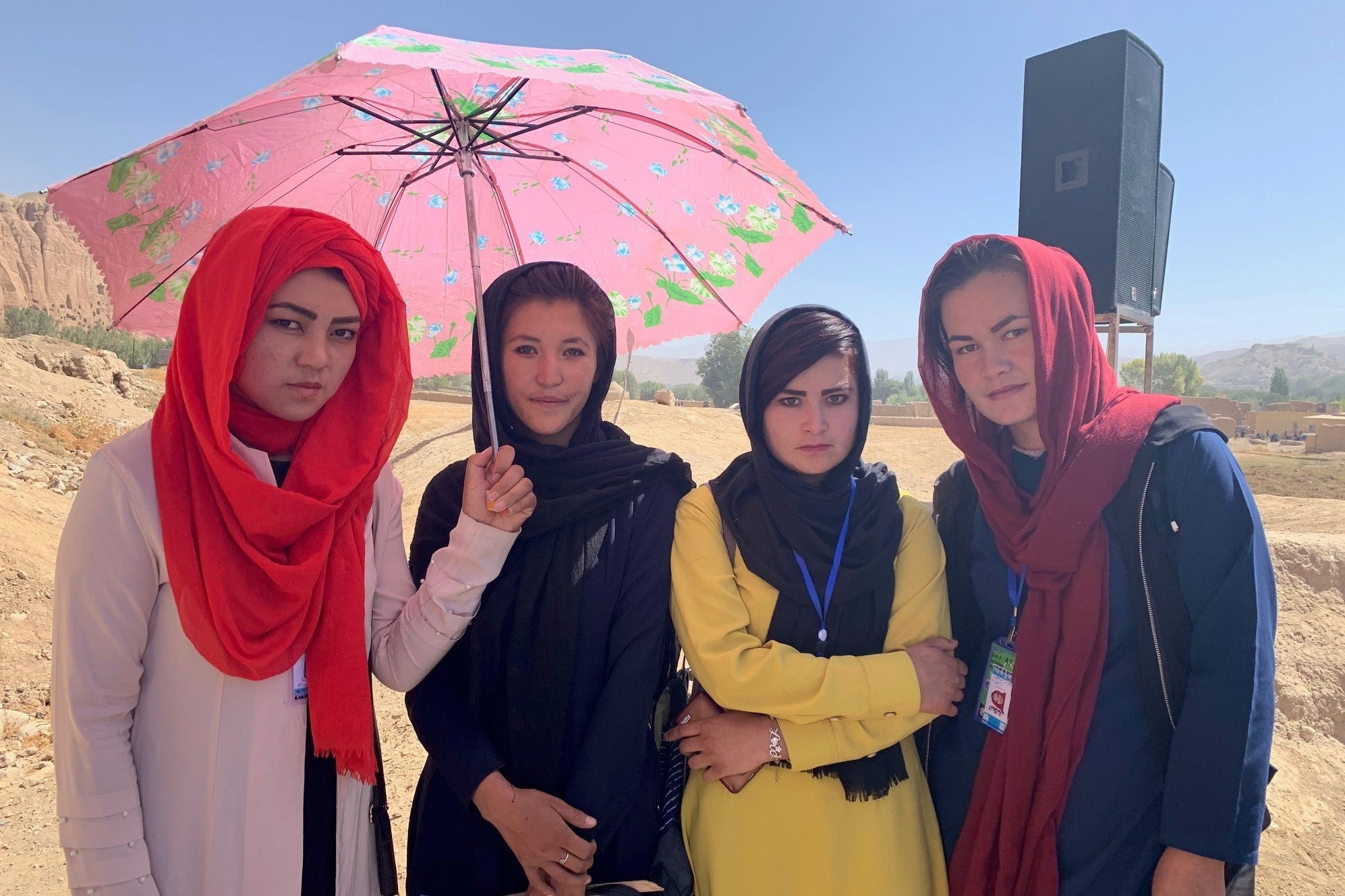 A group of young students wait to hear Abdullah speak