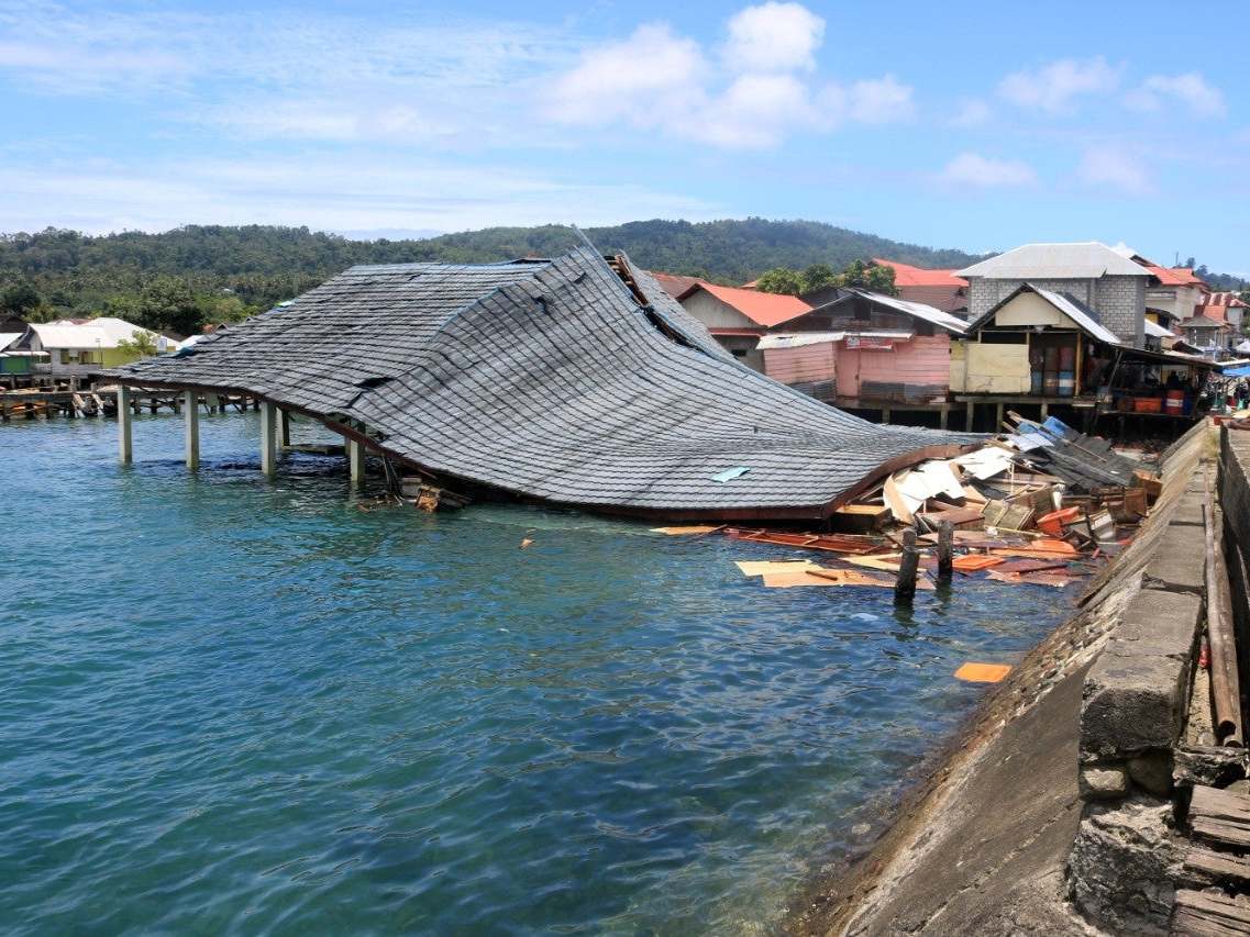 A damaged traditional market building is pictured following an earthquake in Ambon, Indonesia, on 26 September.