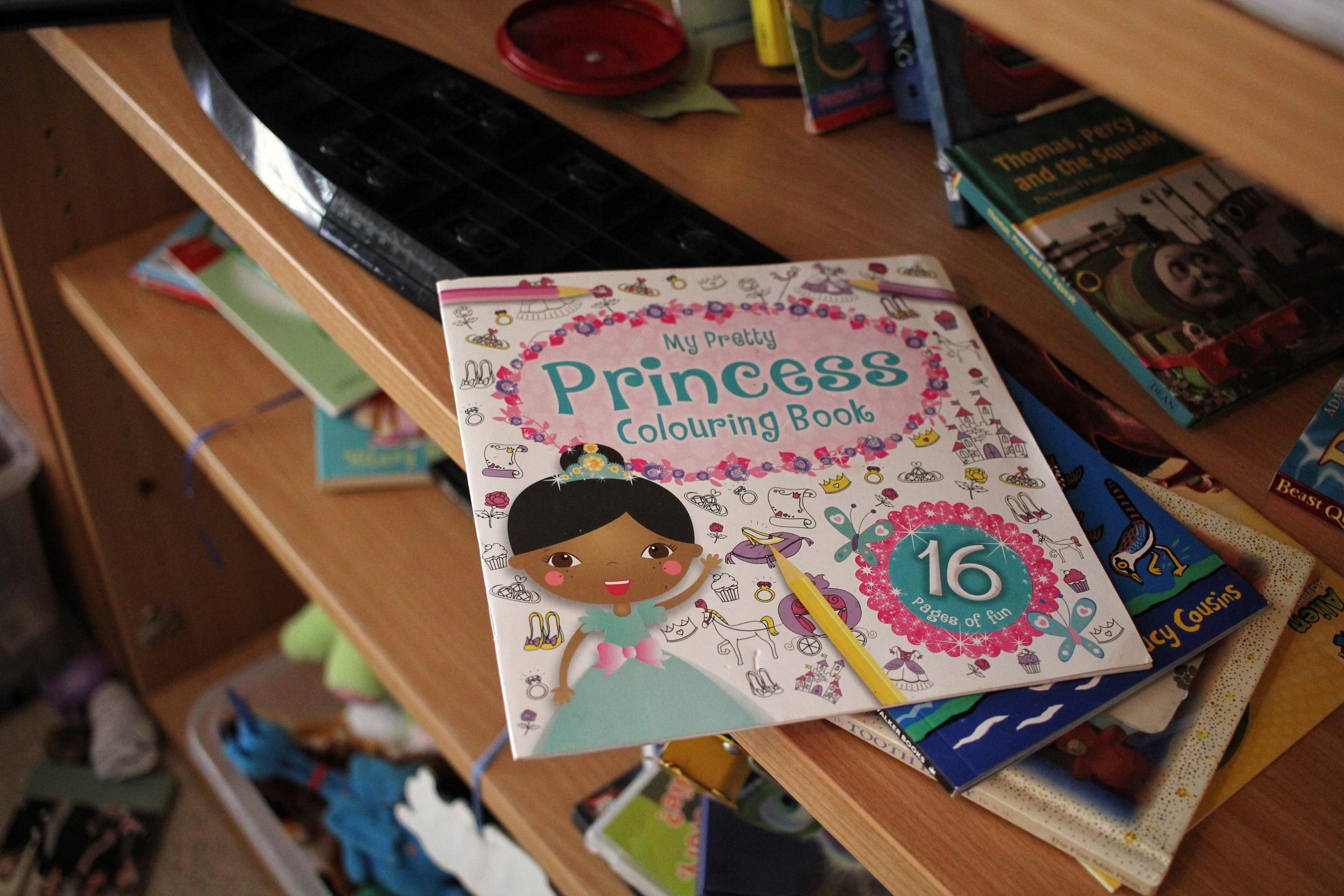 Children's books inside the play area of the refuge