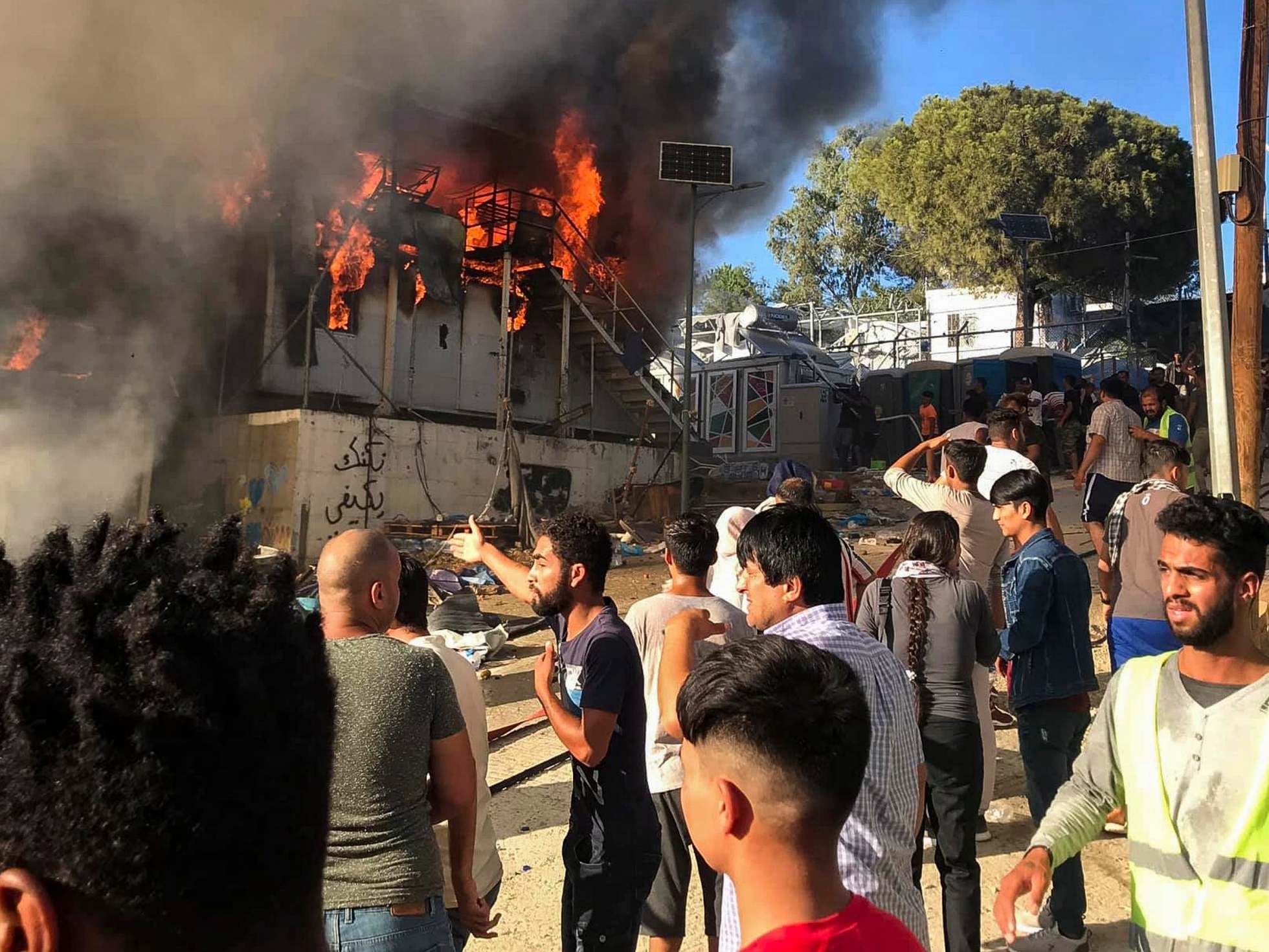 A fire broke out inside a shipping container which Greek authorities use to house refugees