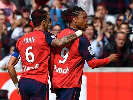 Loic Remy celebrates scoring Ligue 1's goal of the season against Bordeaux