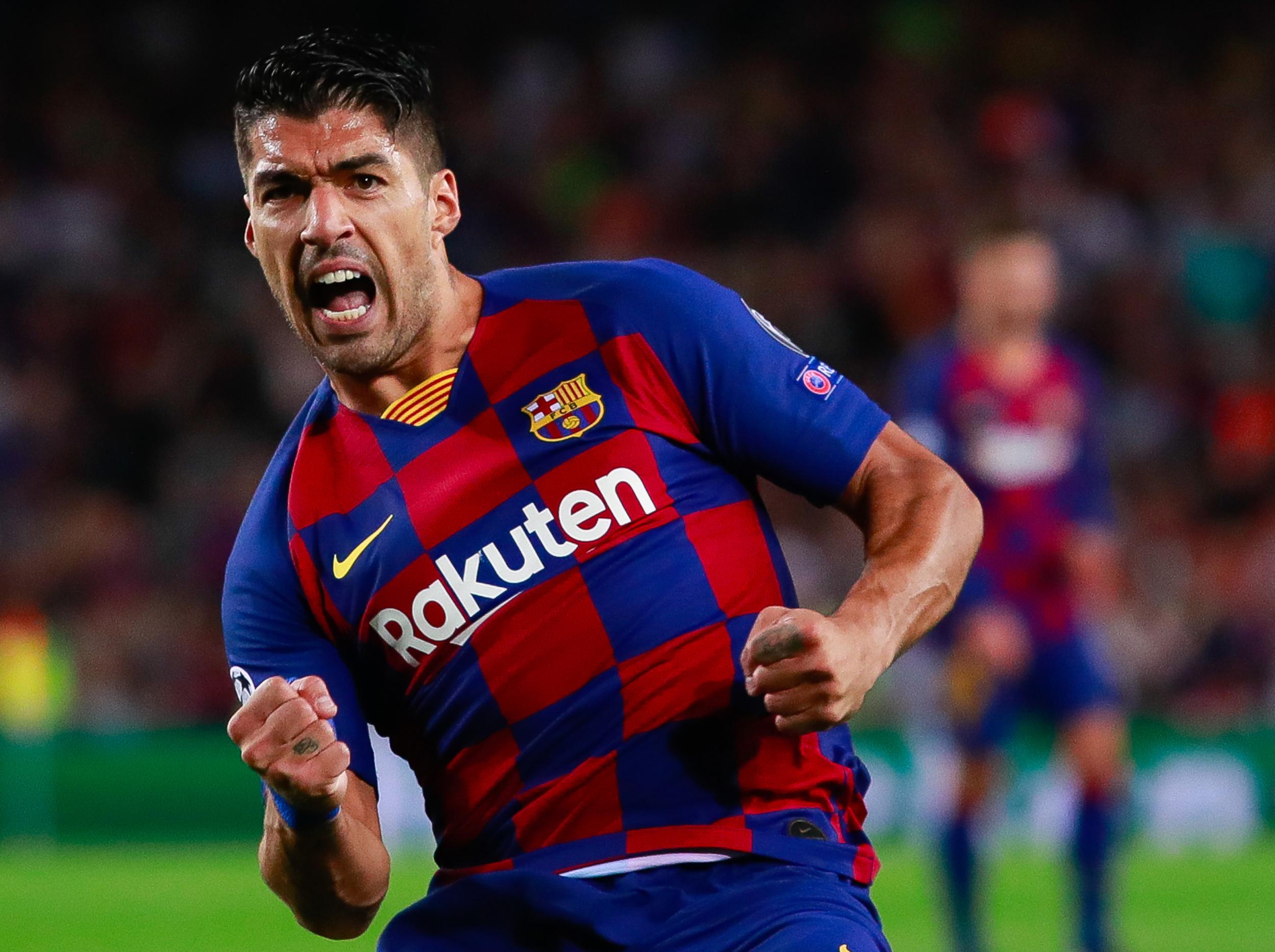 Luis Suarez struck twice for Barcelona