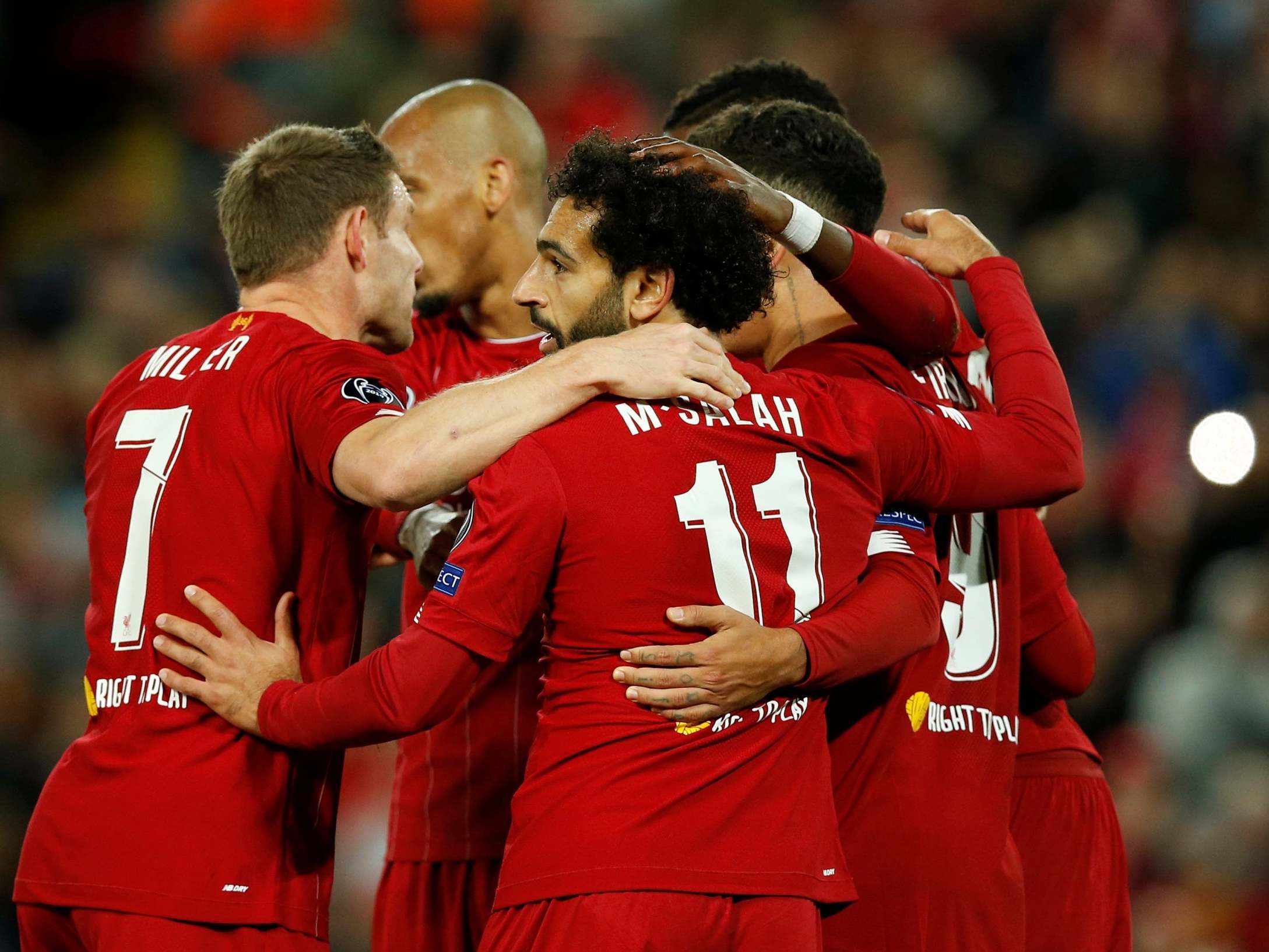 Liverpool celebrate Mohamed Salah's winner