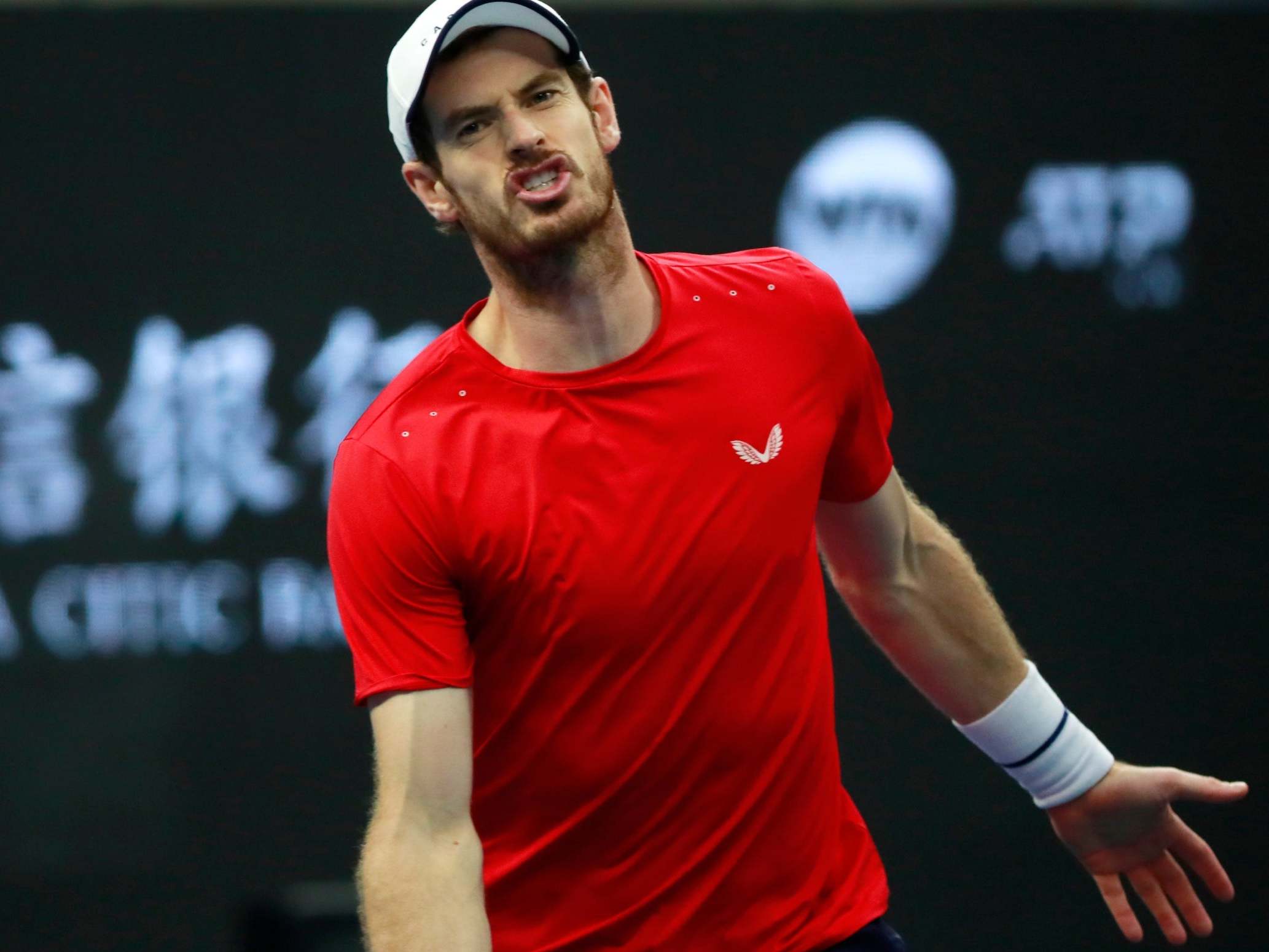 Andy Murray reacts during his defeat to Dominic Thiem