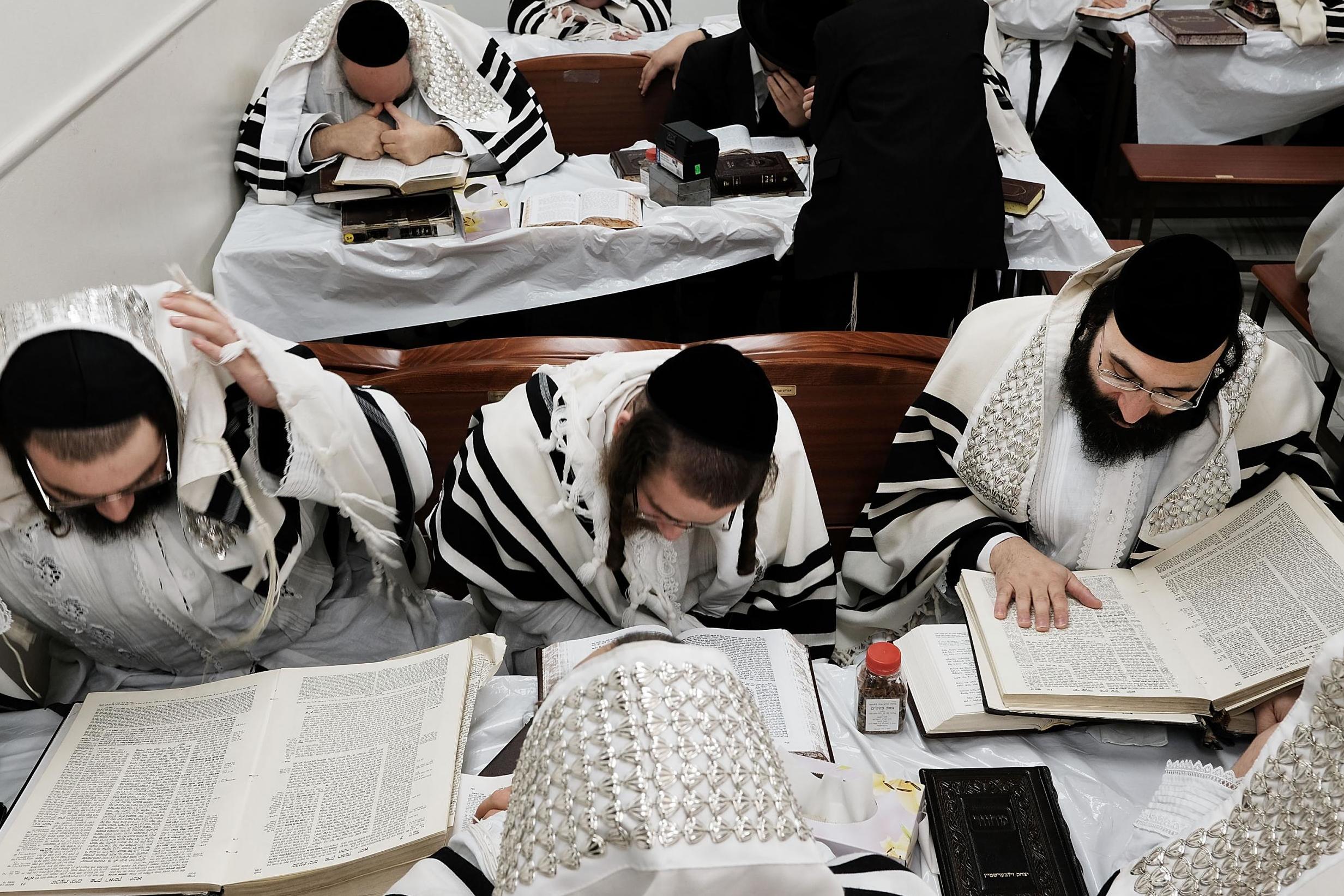 Orthodox Jews study the Torah in Brooklyn on Yom Kippur