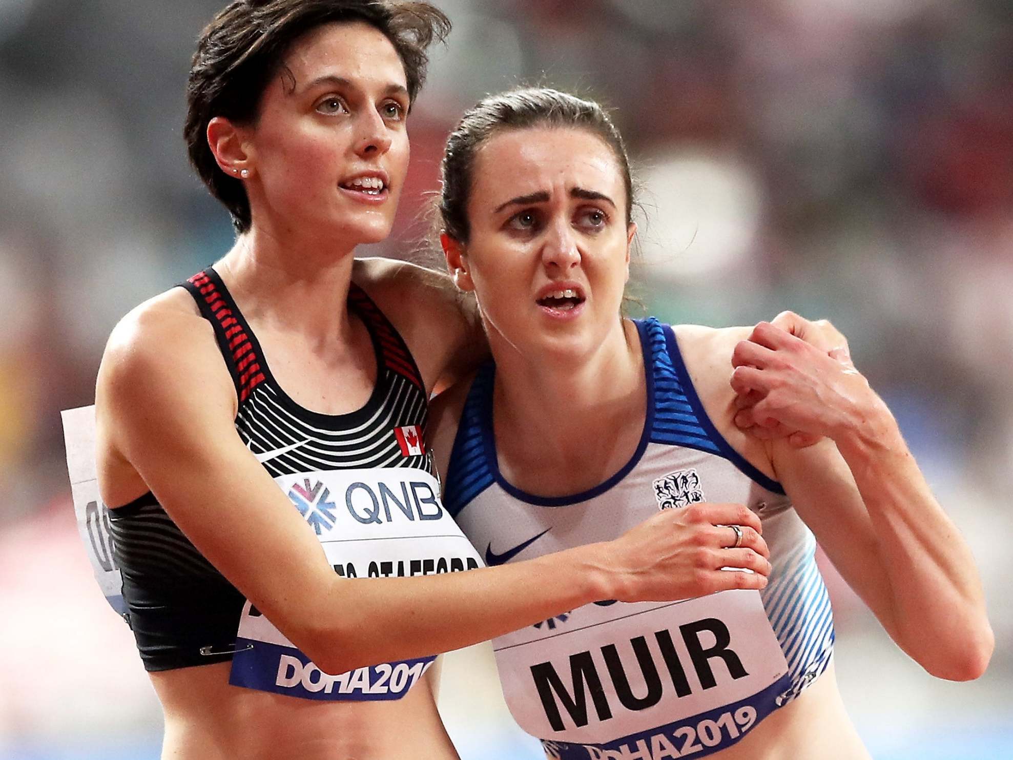 Laura Muir is held by Gabriela Debues-Stafford after coming up short