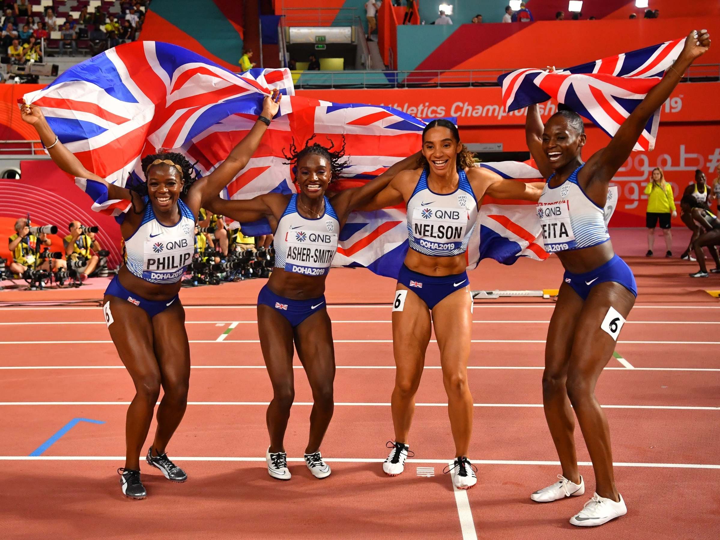 Britain’s Asha Philip, Dina Asher-Smith, Ashleigh Nelson and Daryll Neita celebrate winning silver