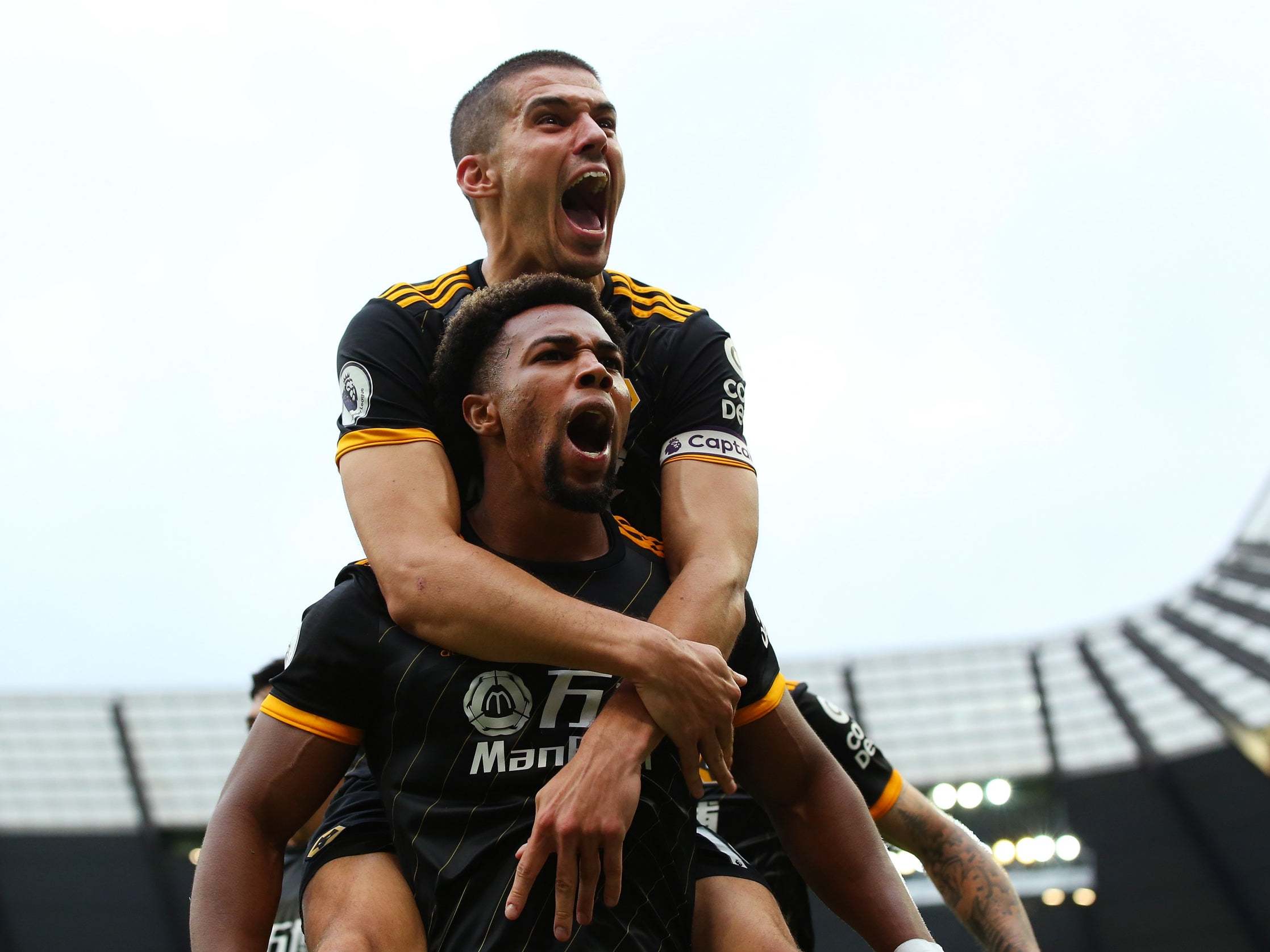 Adam Traore celebrates giving Wolves the lead