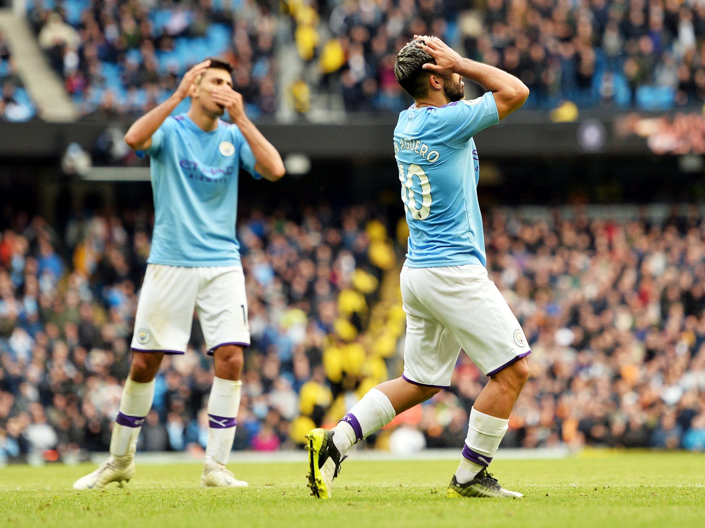 Man City's players react to a damaging defeat against Wolves