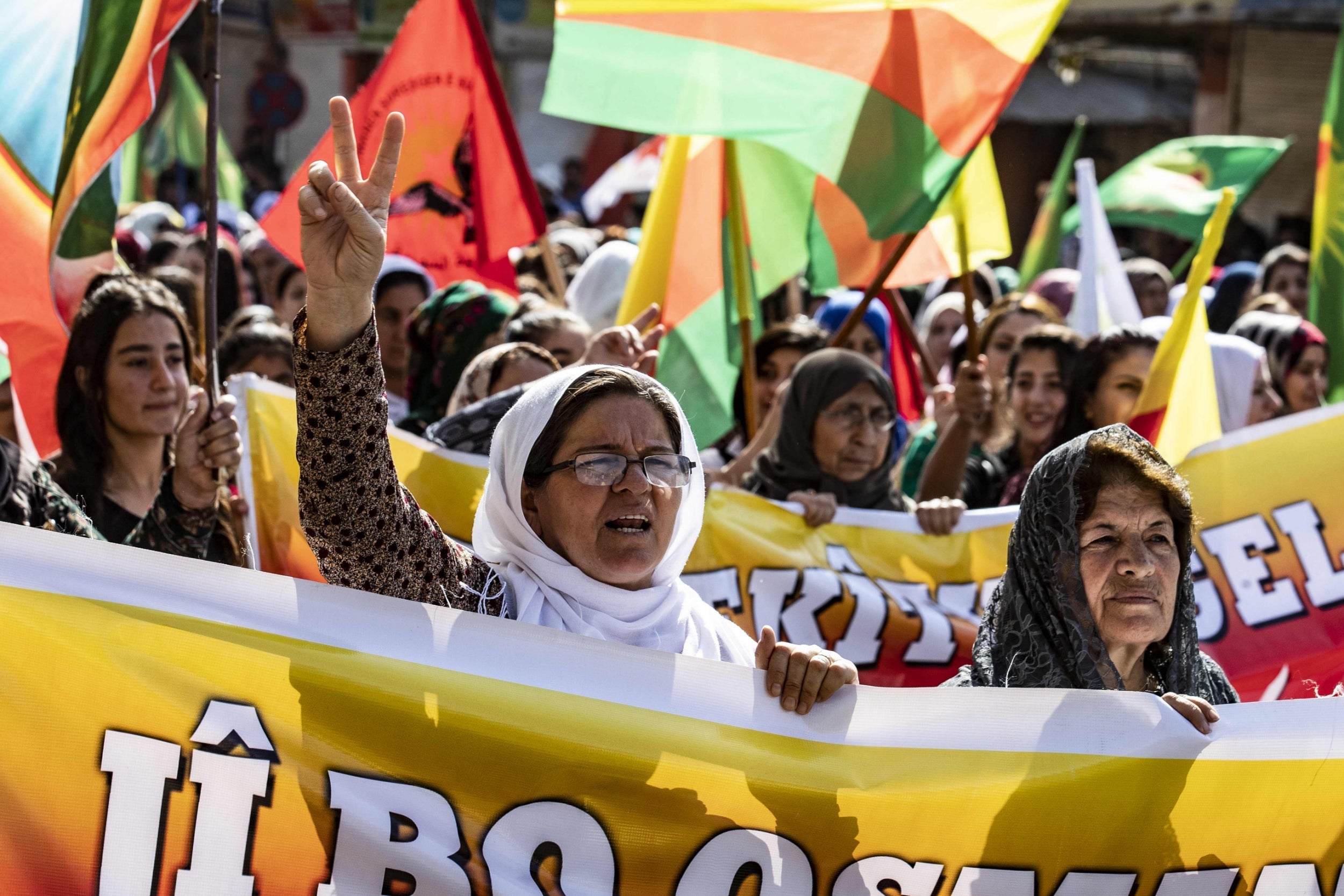 Syrian Kurdish women demonstrate against Turkish military threats in northeastern Syrian (AFP/Getty)