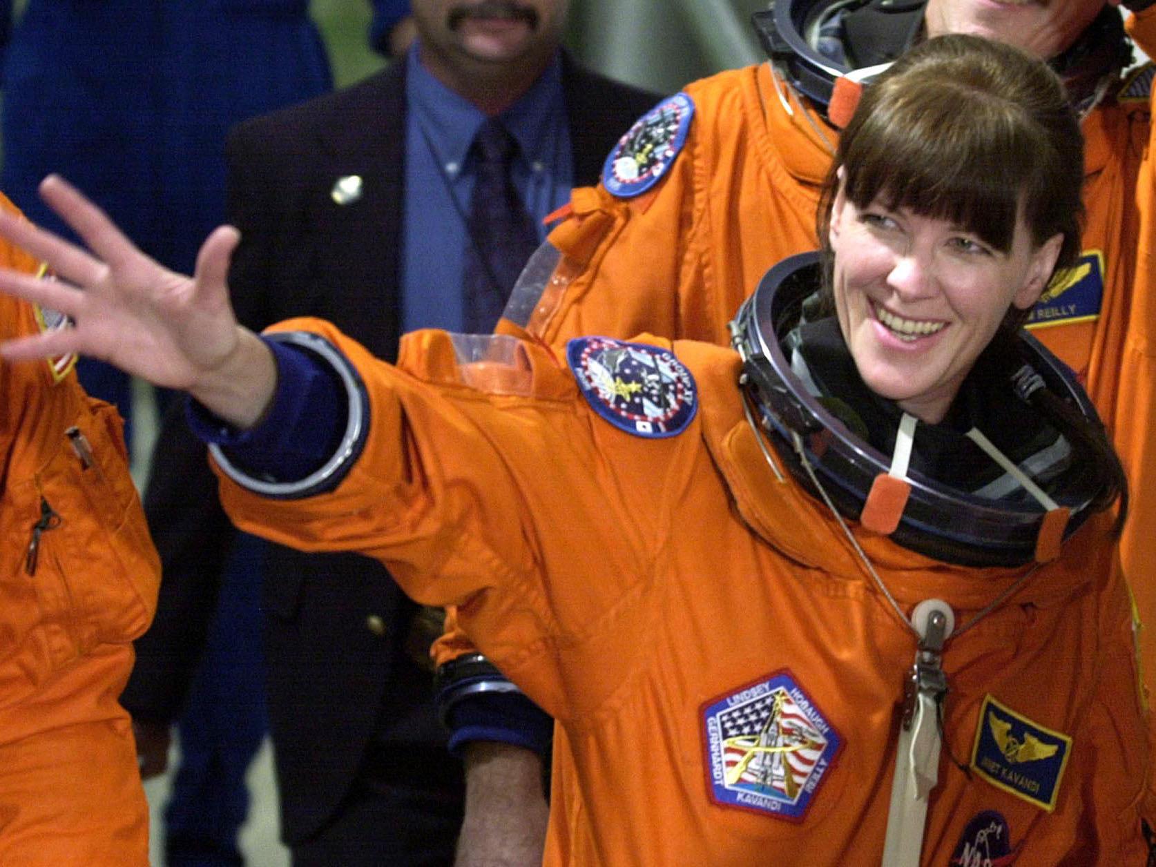 Kavandi waves as she departs the Operations and Checkout Building and heads to launch pad 39-B at the Kennedy Space Center in Florida, 12 July 2001