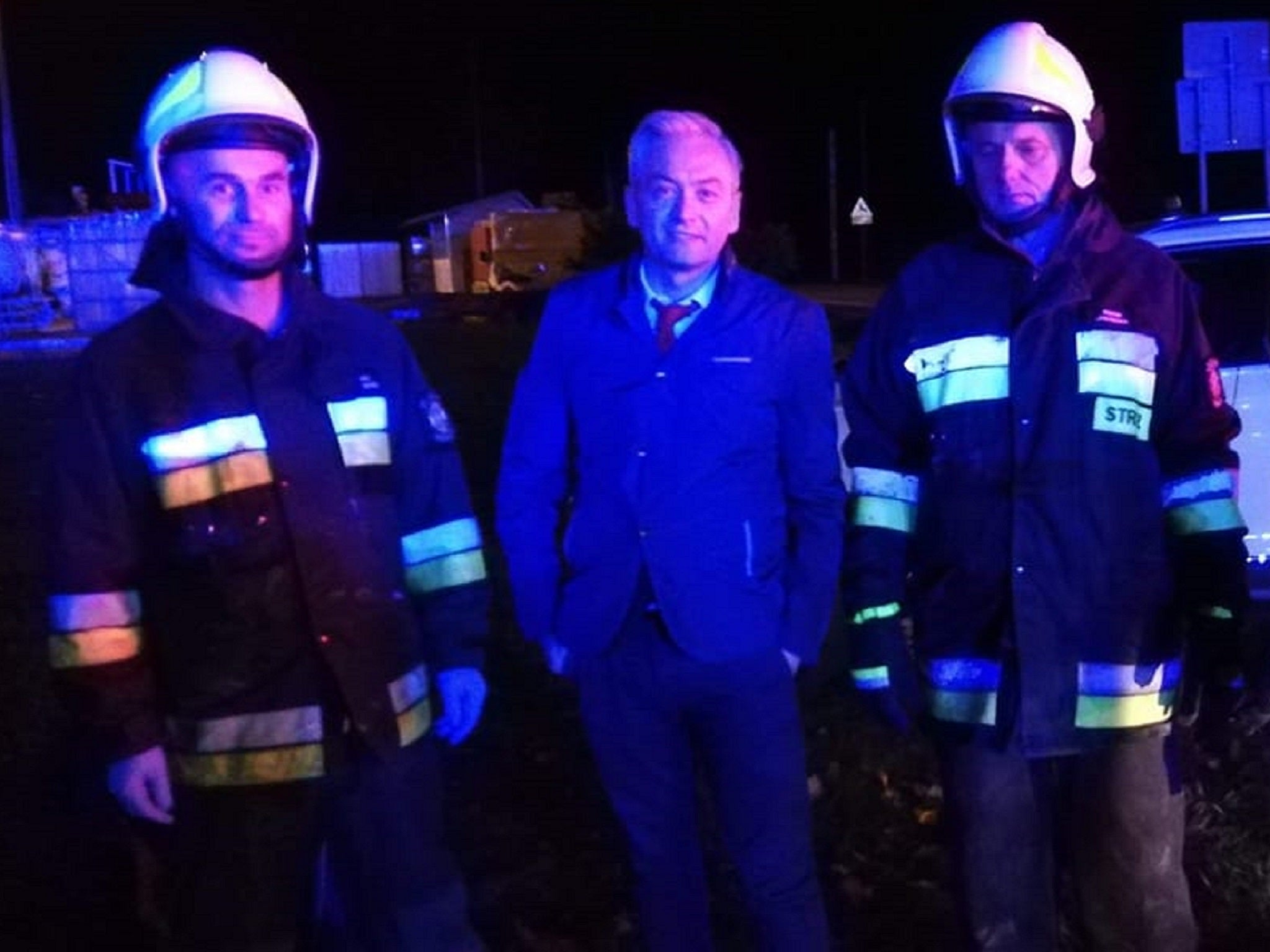 Polish politician Robert Biedron rescued a two-year-old boy and his father from a burning car after a crash in Tabor, near Warsaw, before local firefighters turned up, 7 October 2019.