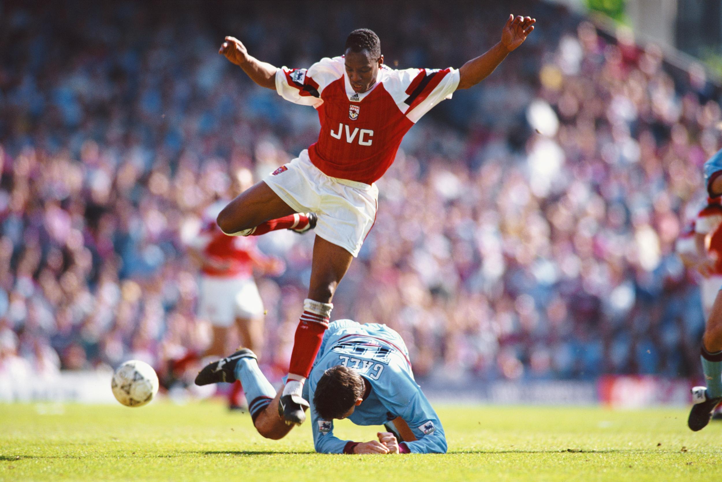 West Ham defender Tony Gale struggles to stop Wright