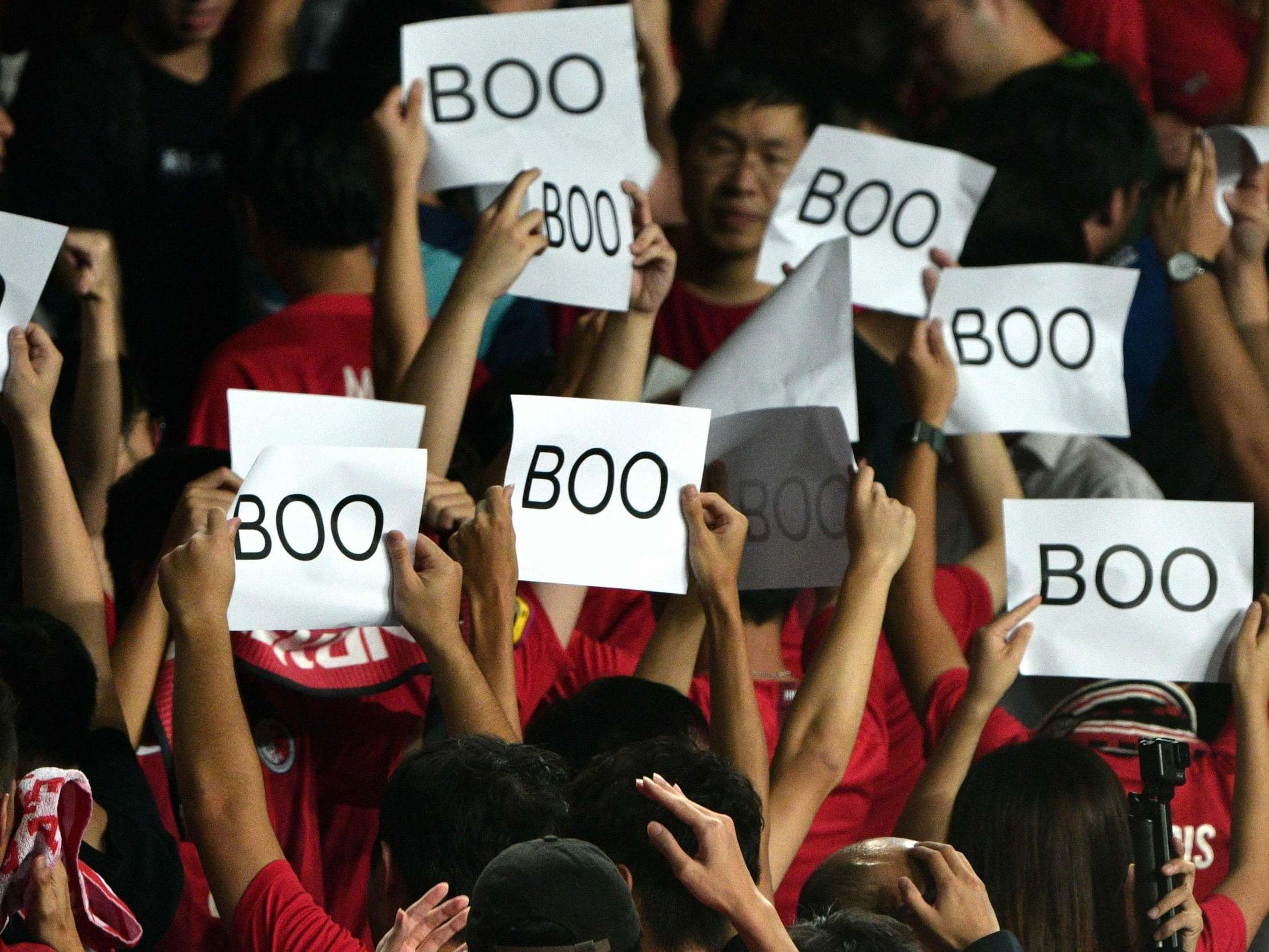 The Hong Kong fans boo the Chinese national anthem