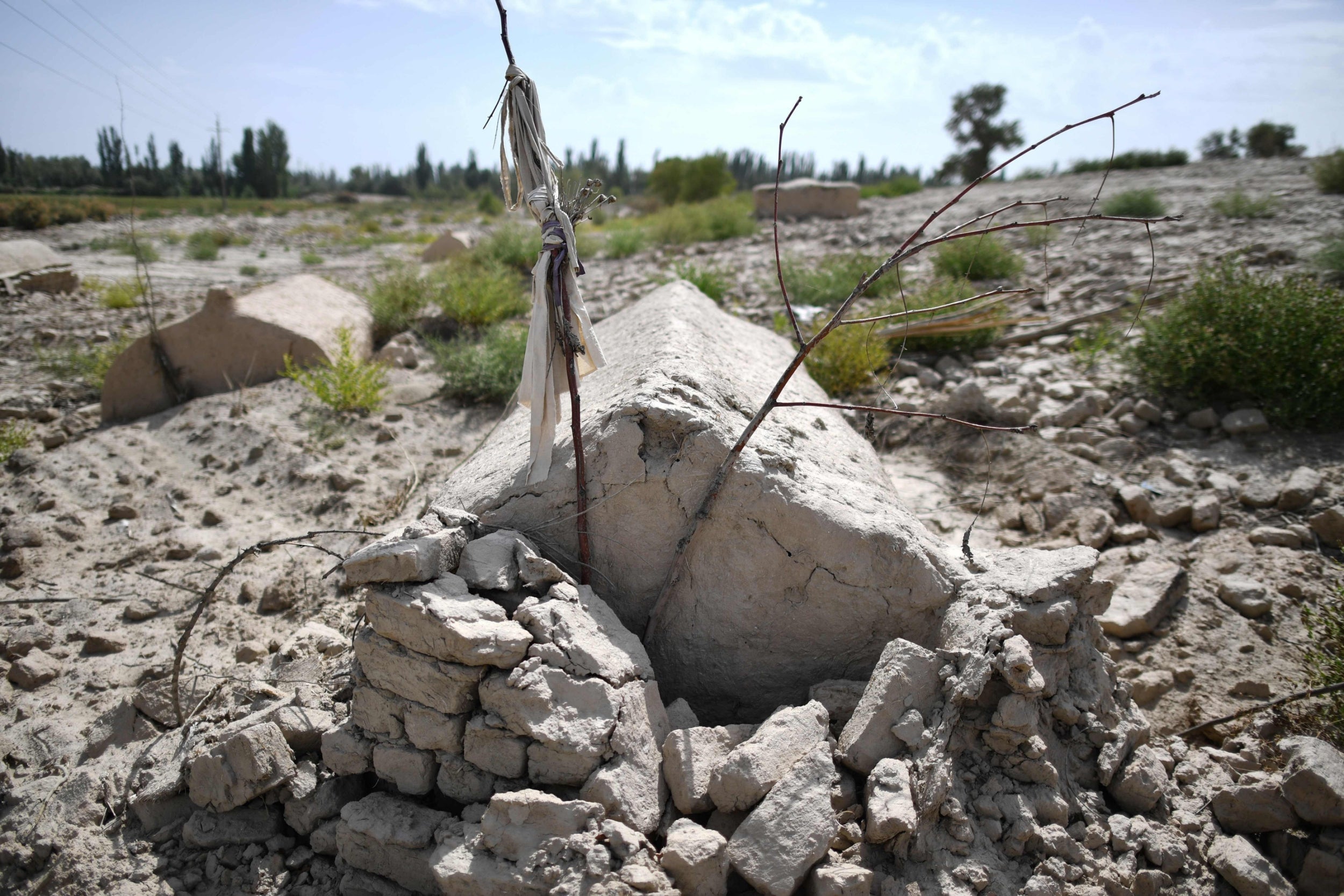 Photo taken in September shows what used to be a traditional Uighur cemetery before it was destroyed in Shayar in the region of Xinjiang