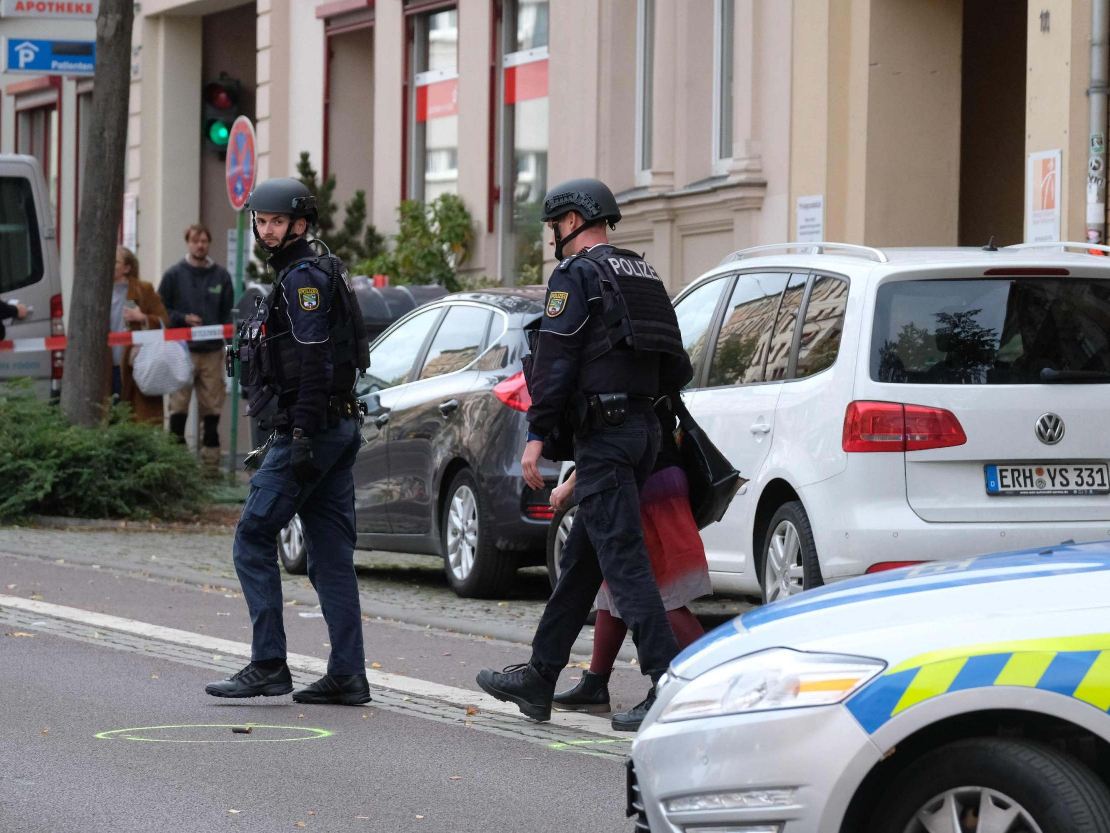 Police block the area around the site of a shooting in Halle, Germany, on 9 October (dpa/AFP via Getty Images)