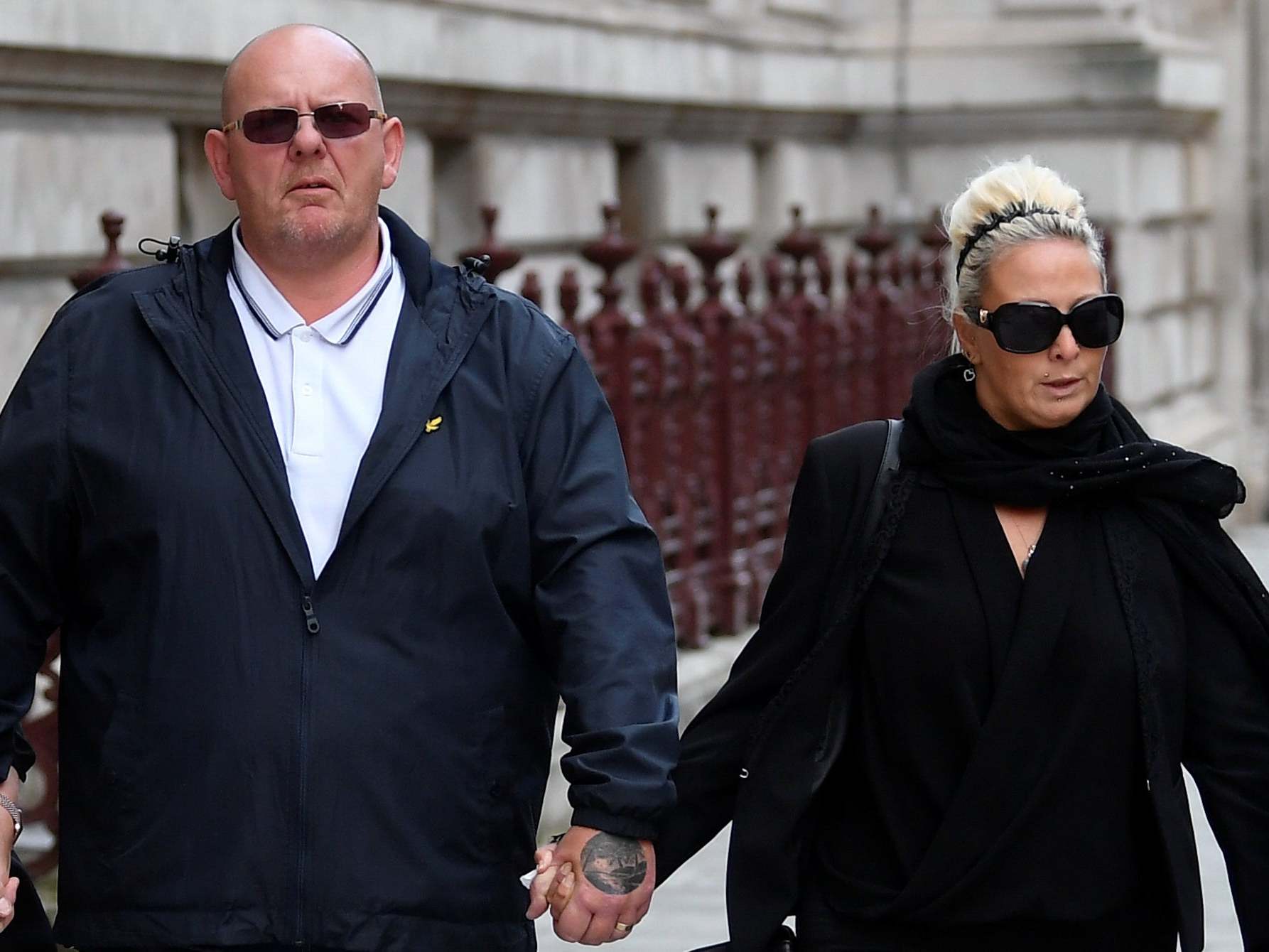 Tim Dunn and Charlotte Charles, parents of Harry Dunn, leave the Foreign and Commonwealth office in London