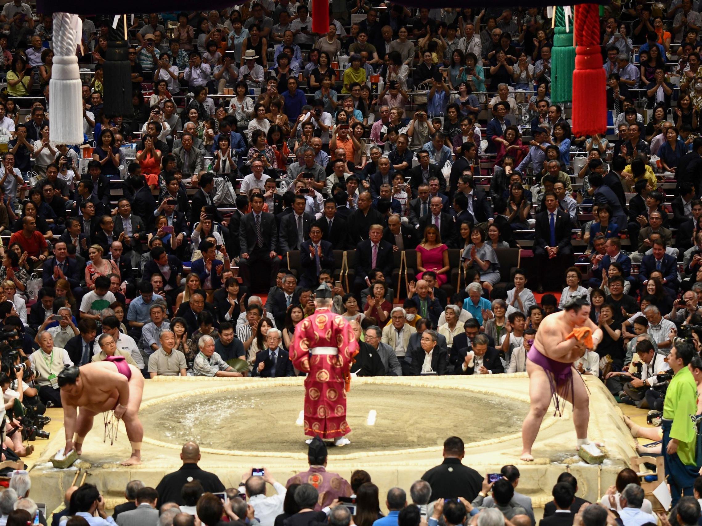 US President Donald Trump and First Lady Melania Trump watch on during last May’s Summer Grand Sumo Tournament in Tokyo