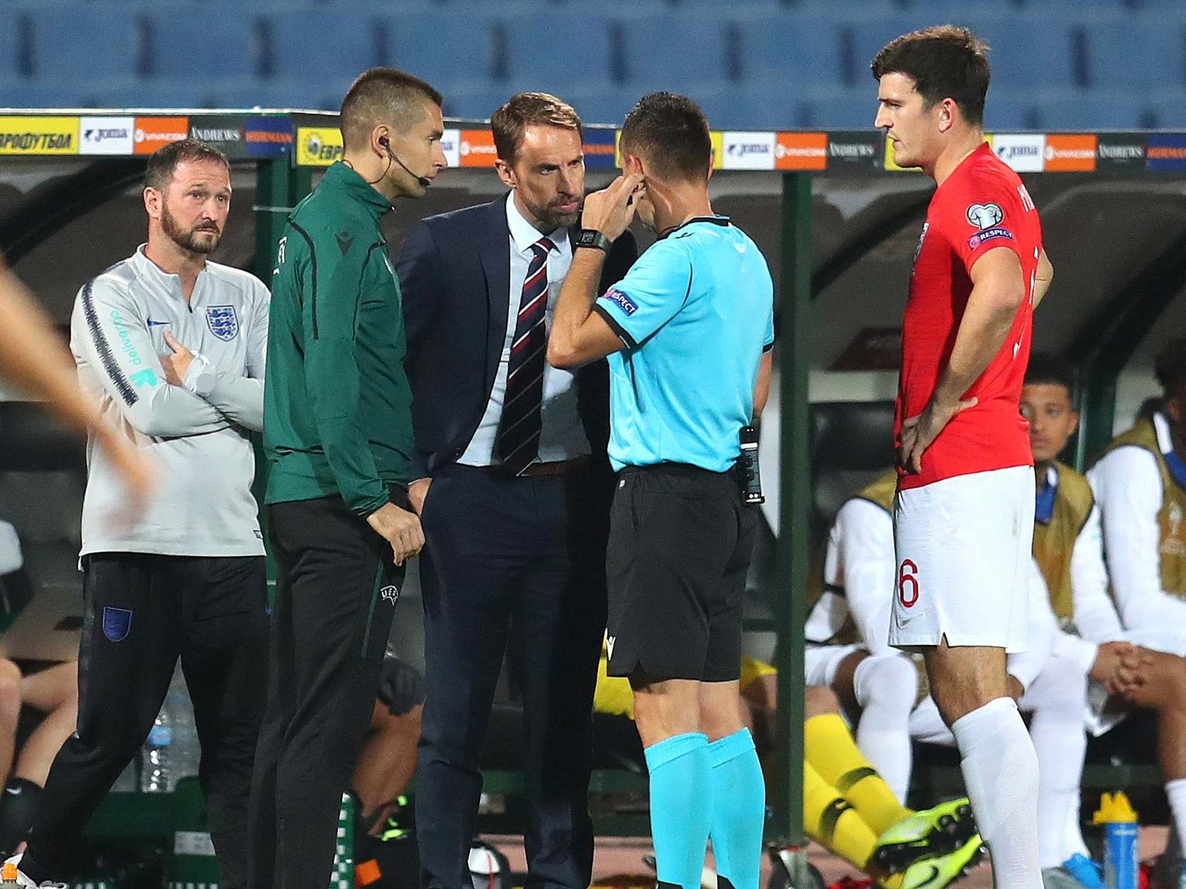 Gareth Southgate speaks with referee Vasil Levski