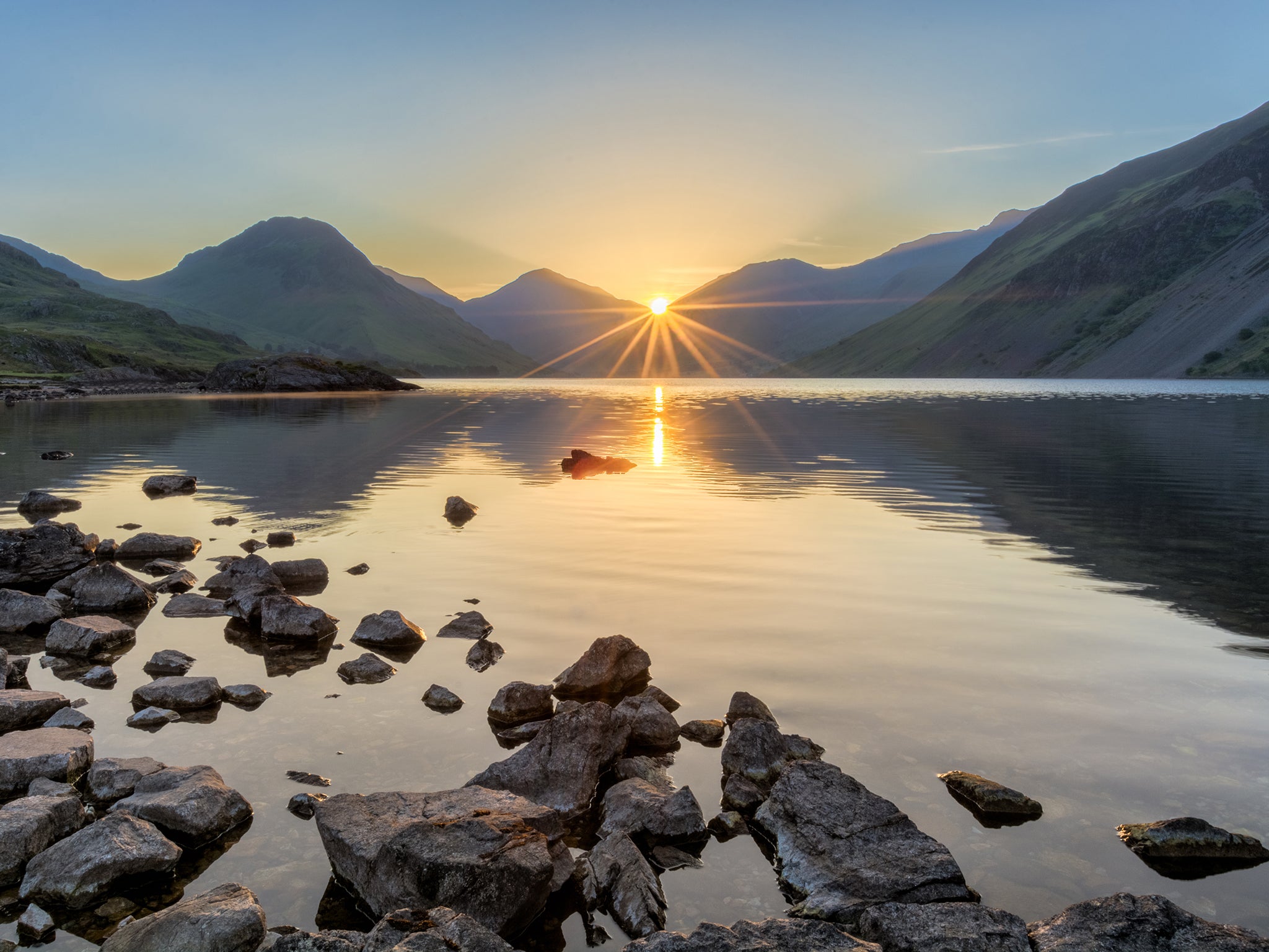 The sun rises at Wastwater, in the Lake District