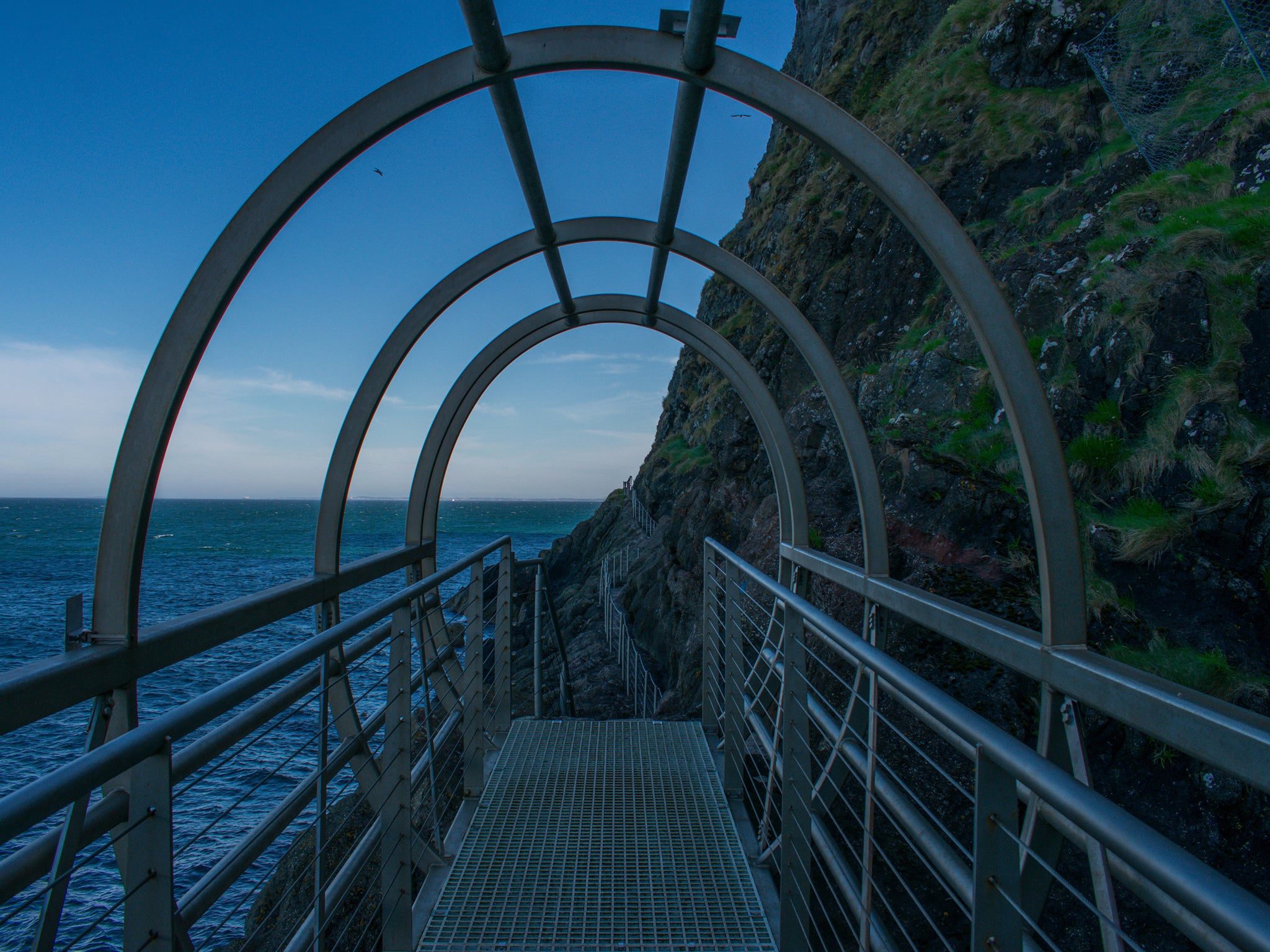 A steel bridge that runs along the path of The Gobbins, Northern Ireland