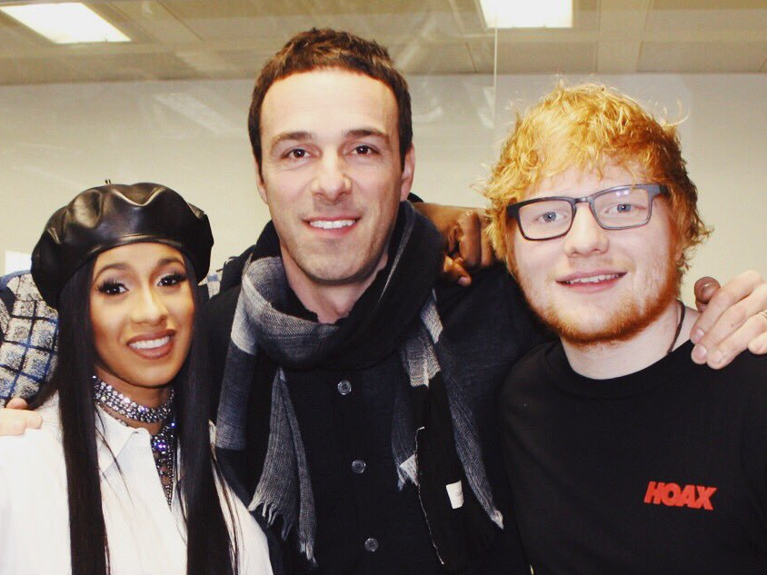 Former Atlantic Records president Ben Cook (centre) poses with Cardi B and Ed Sheeran in 2017