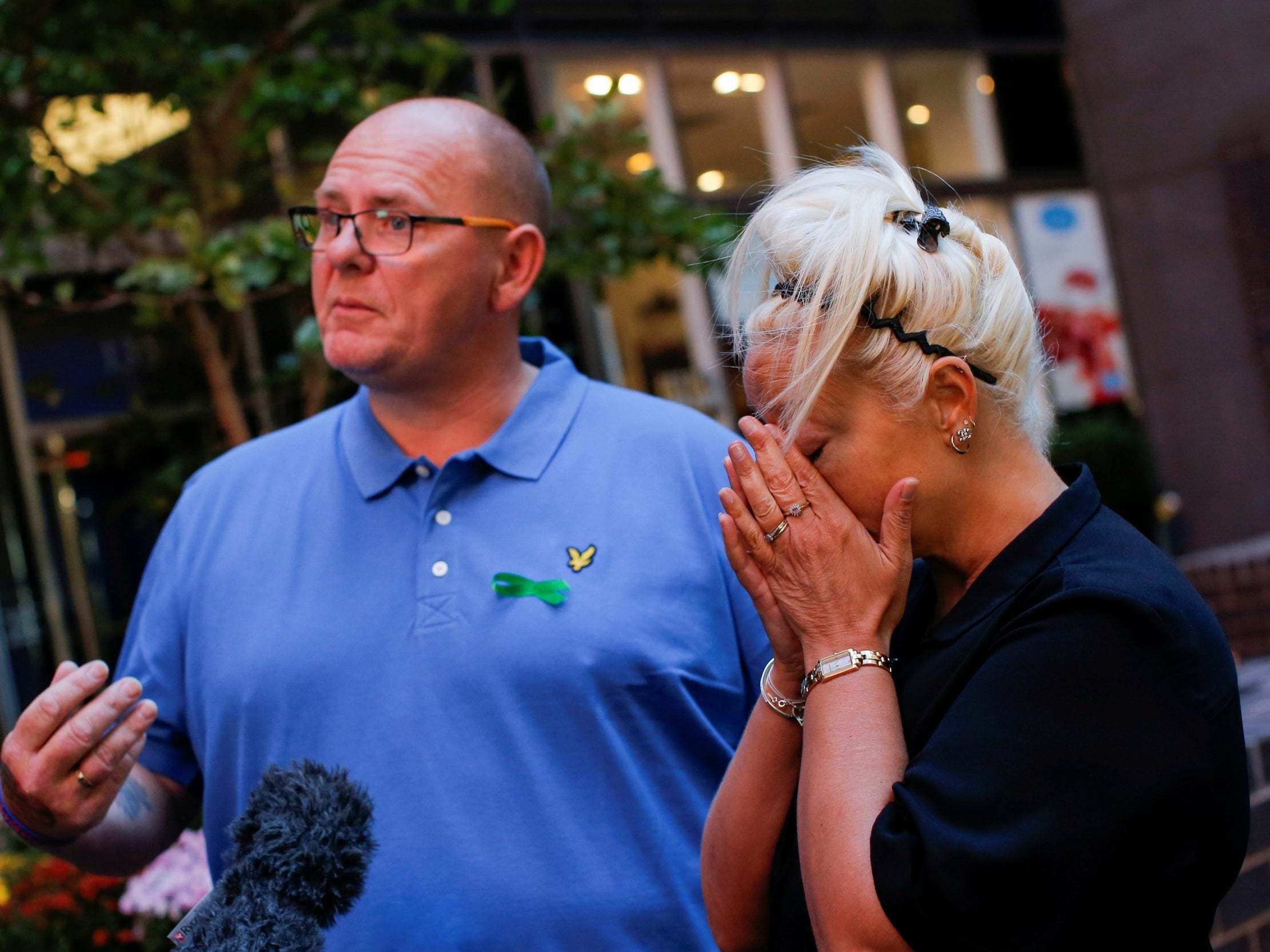 Tin Dunn and Charlotte Charles speak to media in the US