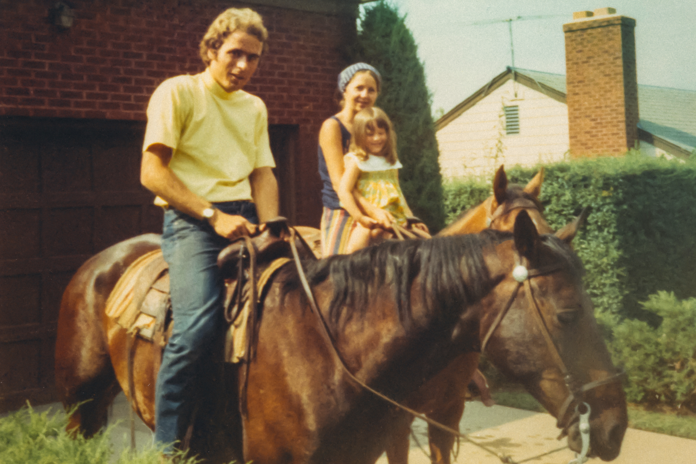 Ted Bundy with his then-girlfriend Elizabeth Kendall and her daughter Molly.