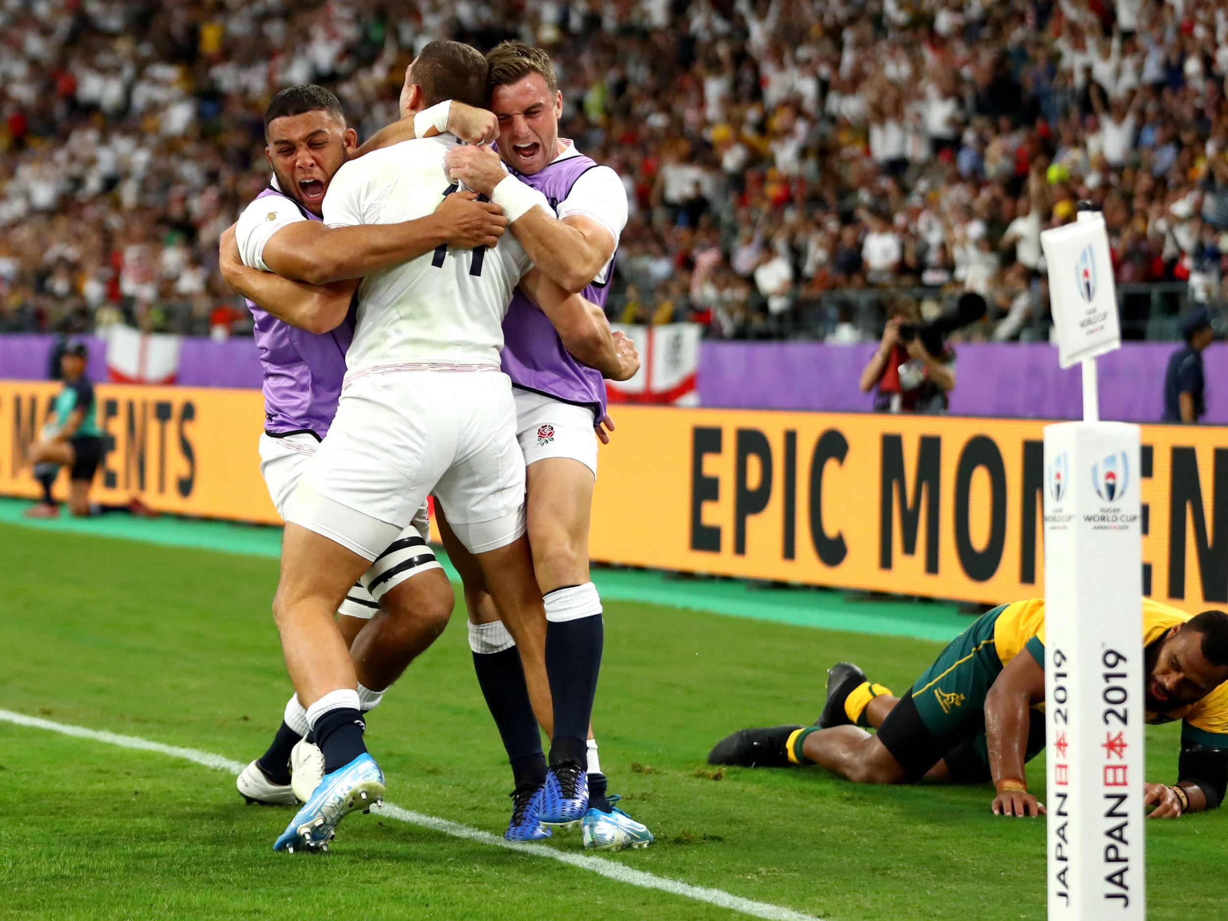 Jonny May celebrates with Lewis Ludlam and George Ford