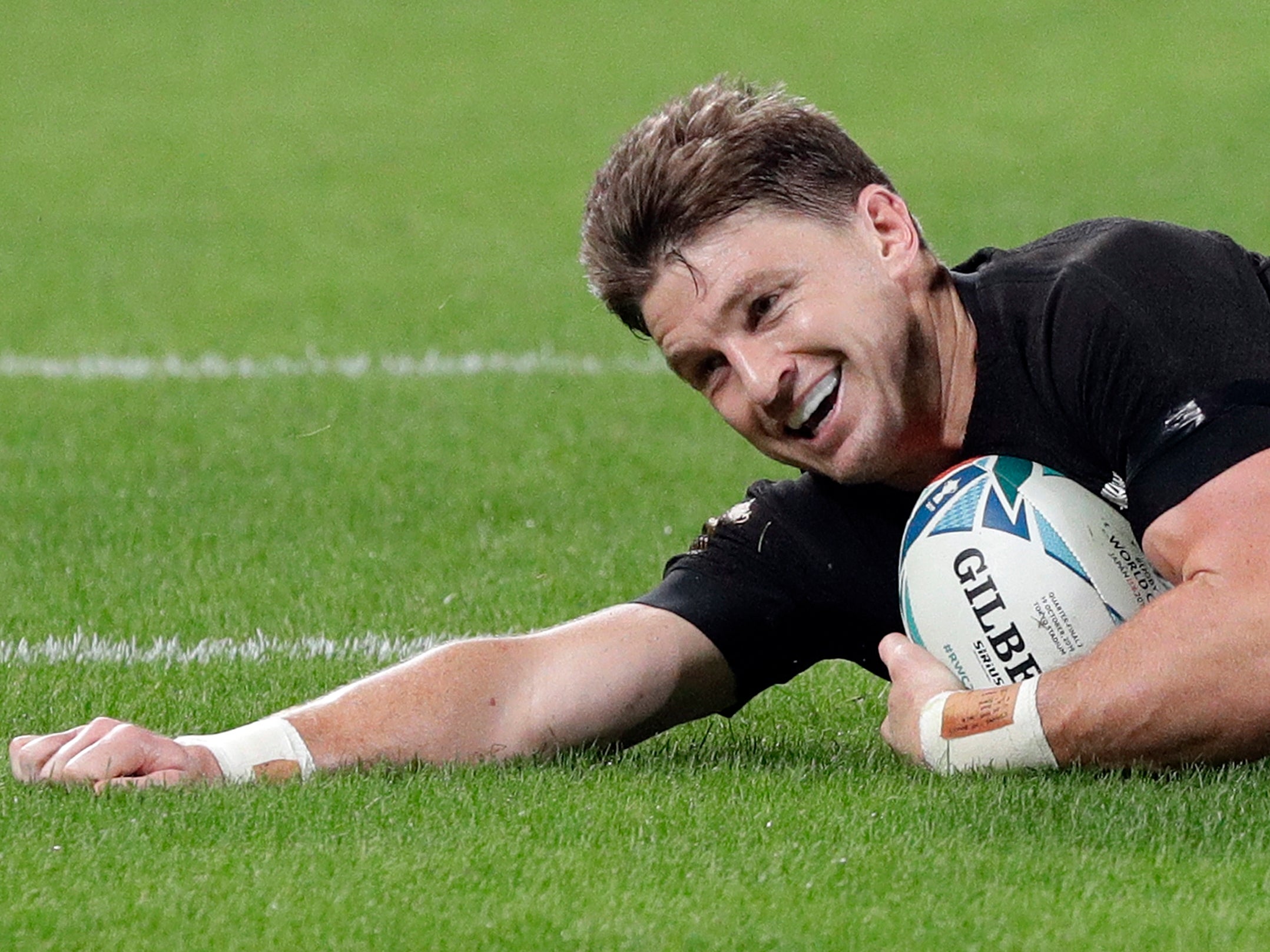 Beauden Barrett crosses the tryline for the All Blacks