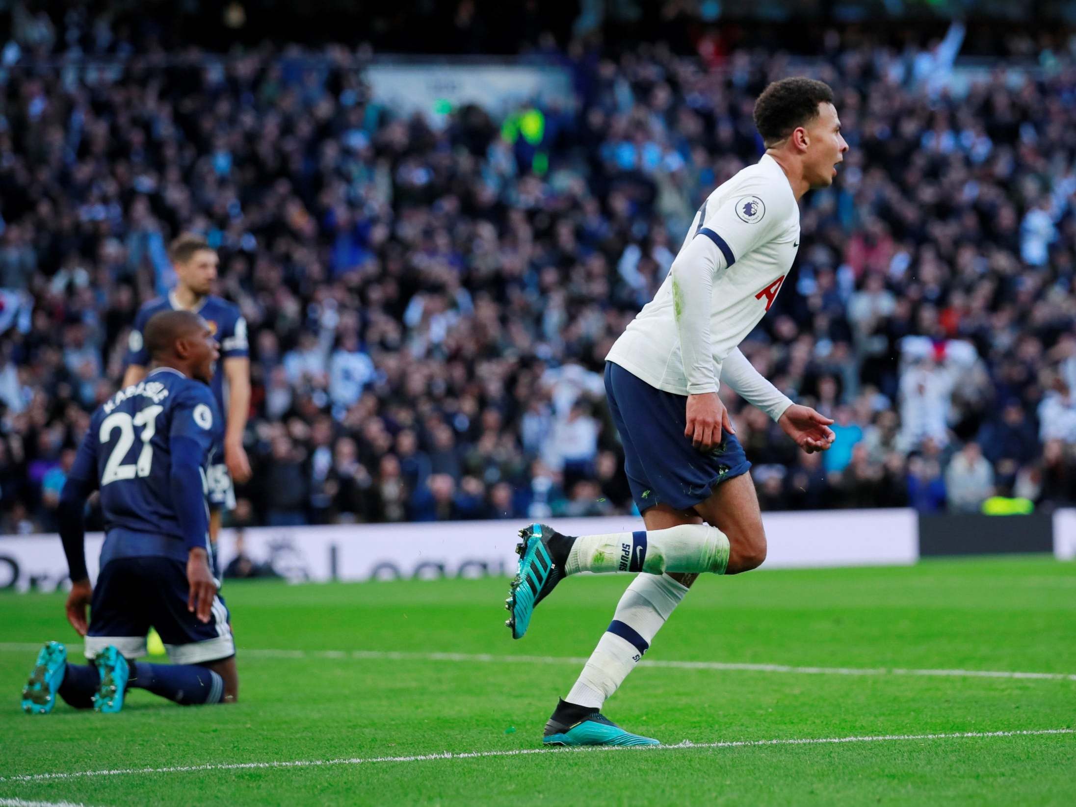 Dele Alli celebrates his late equaliser