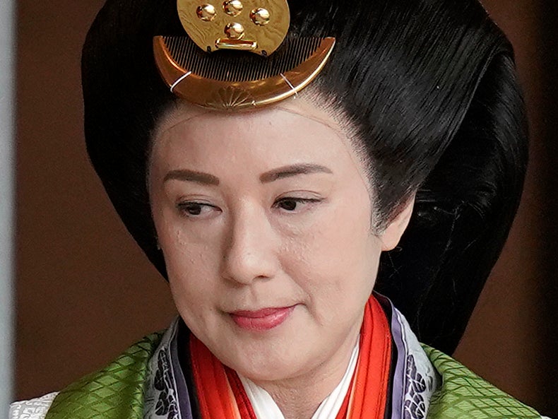 Japan’s Empress Masako sat next to her husband during the ceremony