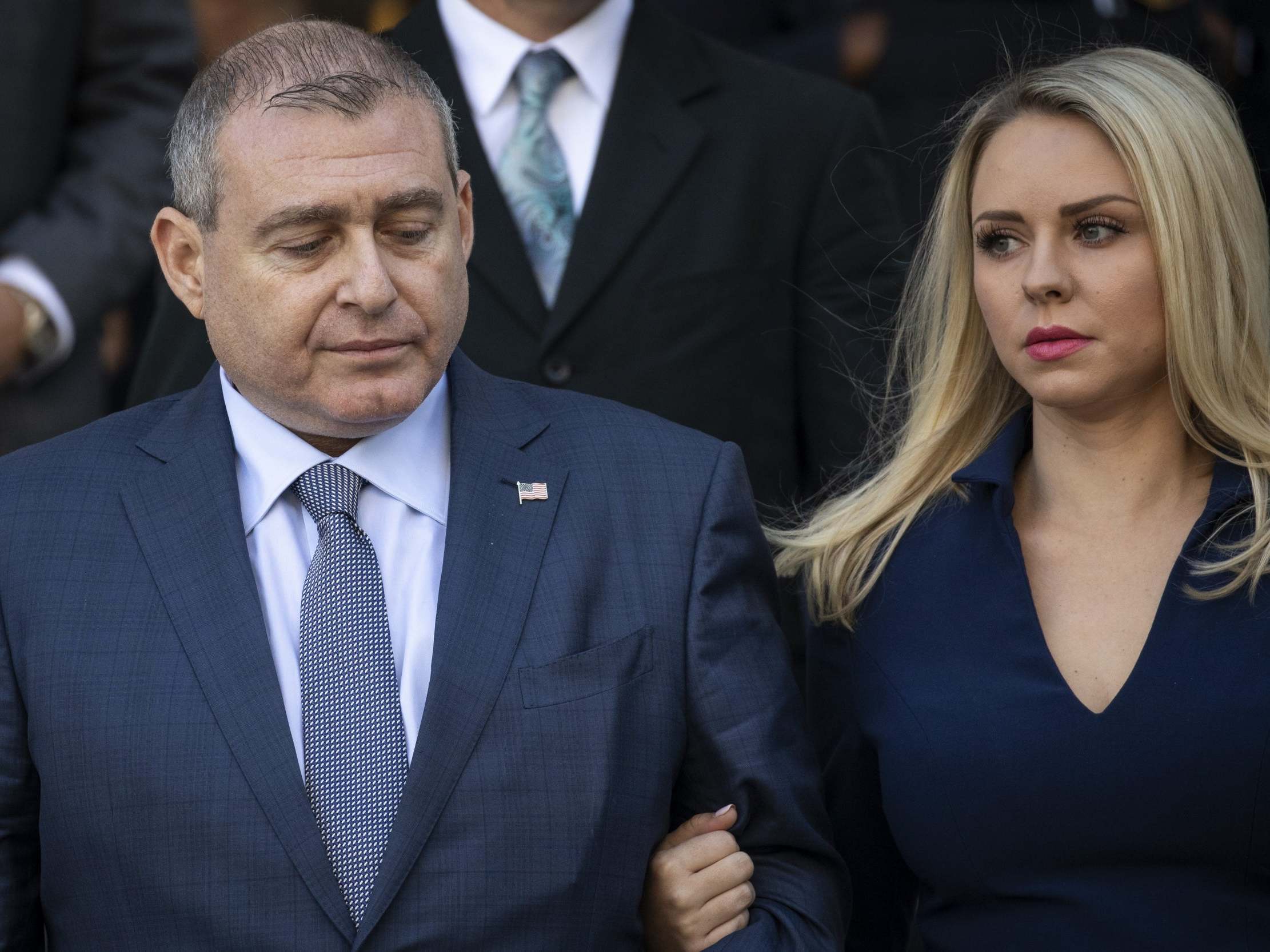 Lev Parnas leaves federal court with his wife following his arraignment on 23 October.