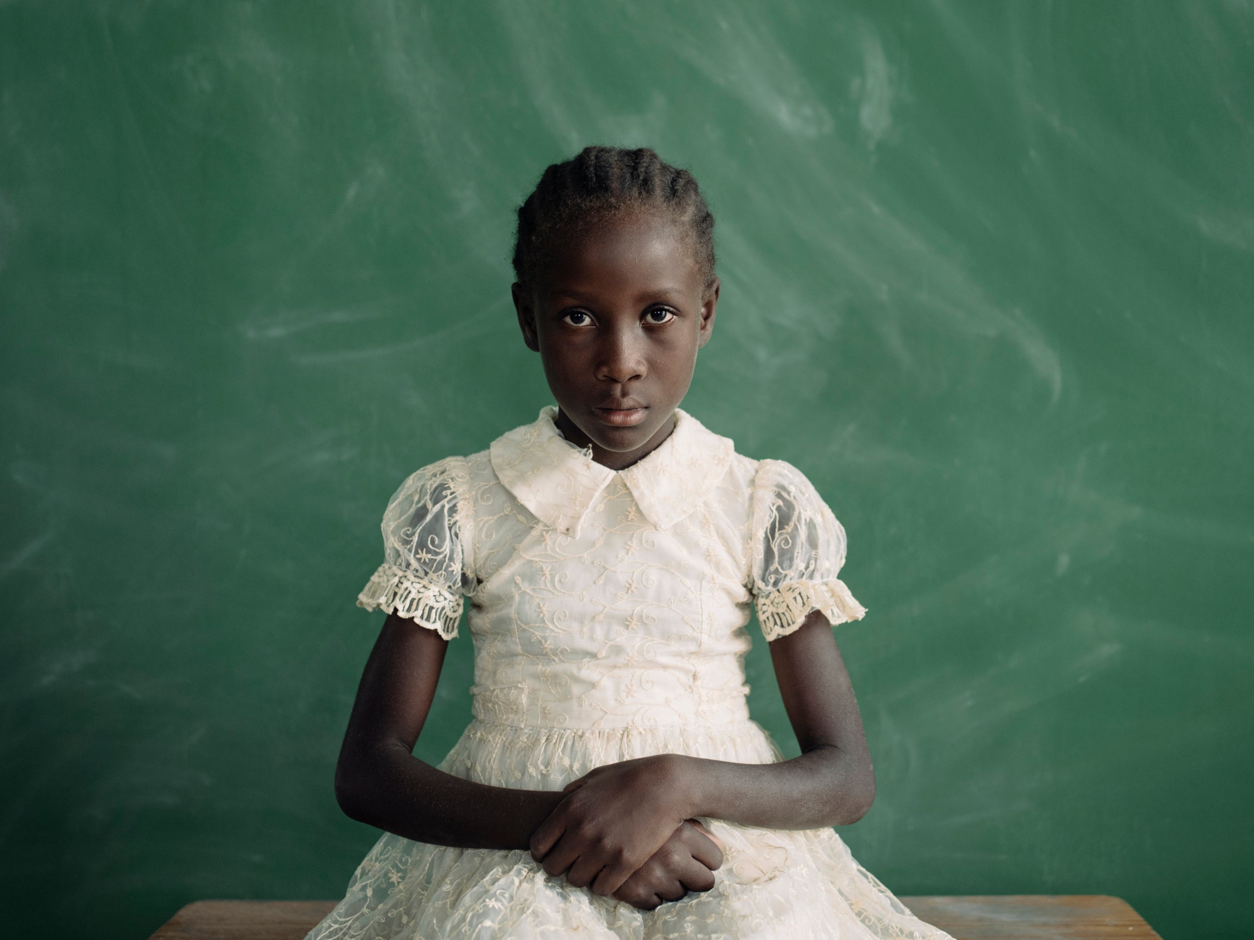 Forestal, nine, is in second grade at Marescot School, Haiti. The school is funded through the partnership between non-profit buildOn Haiti, and Educate A Child (EAC), who have constructed 58 schools, as well as training 959 teachers. Forestal explains how she was given up by her father after the death of her mother. She now lives with her auntie as a ‘restavek’ (child in domestic servitude) where she performs chores around the house for at least two hours a day; including laundry, sweeping and mopping floors. She can only recall seeing her father once in her entire life. ‘It was only for one day, but it was really great, we had so much fun,’ she says. Forestal hopes that she can see him again – but he lives and works in Port Au Prince, more than three hours away by car.