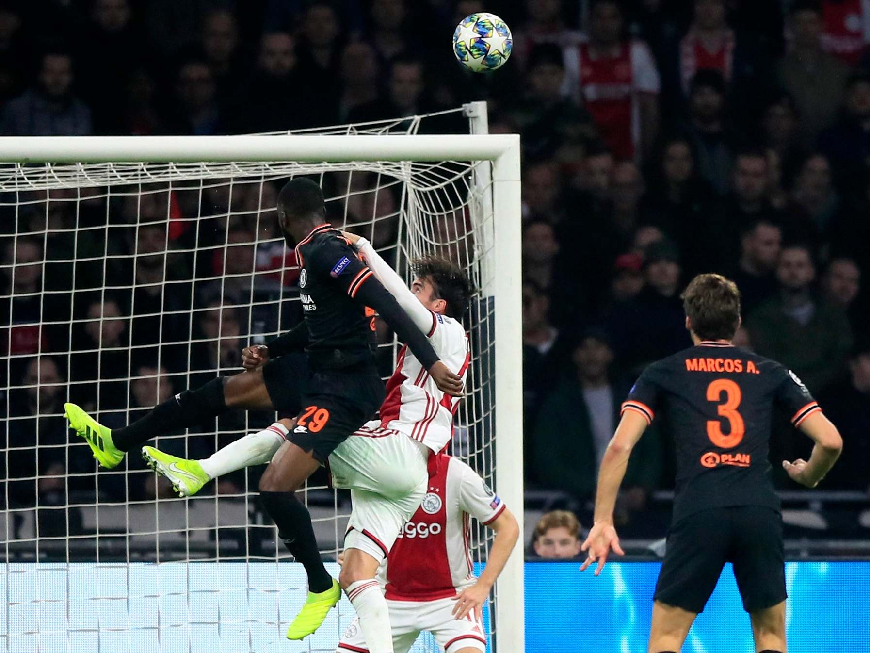 Chelsea's Fikayo Tomori challenges for the ball in the air