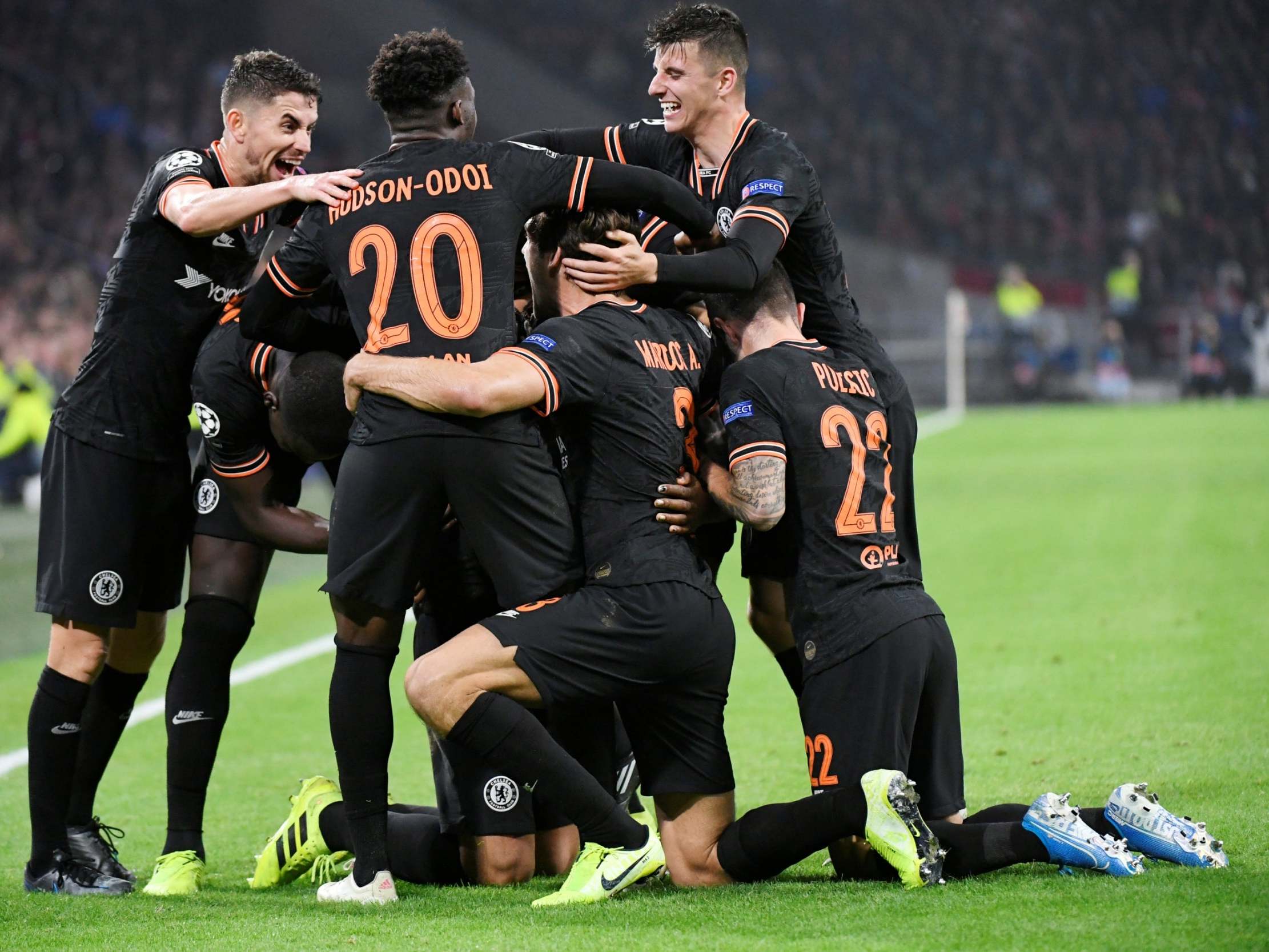 Michy Batshuayi is mobbed by his Chelsea team-mates