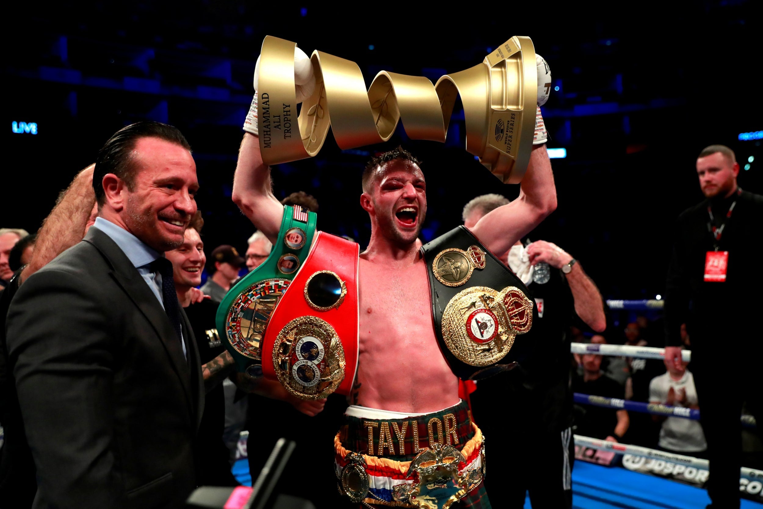 Taylor celebrates unifying the light welterweight division and winning the WBSS (Action)