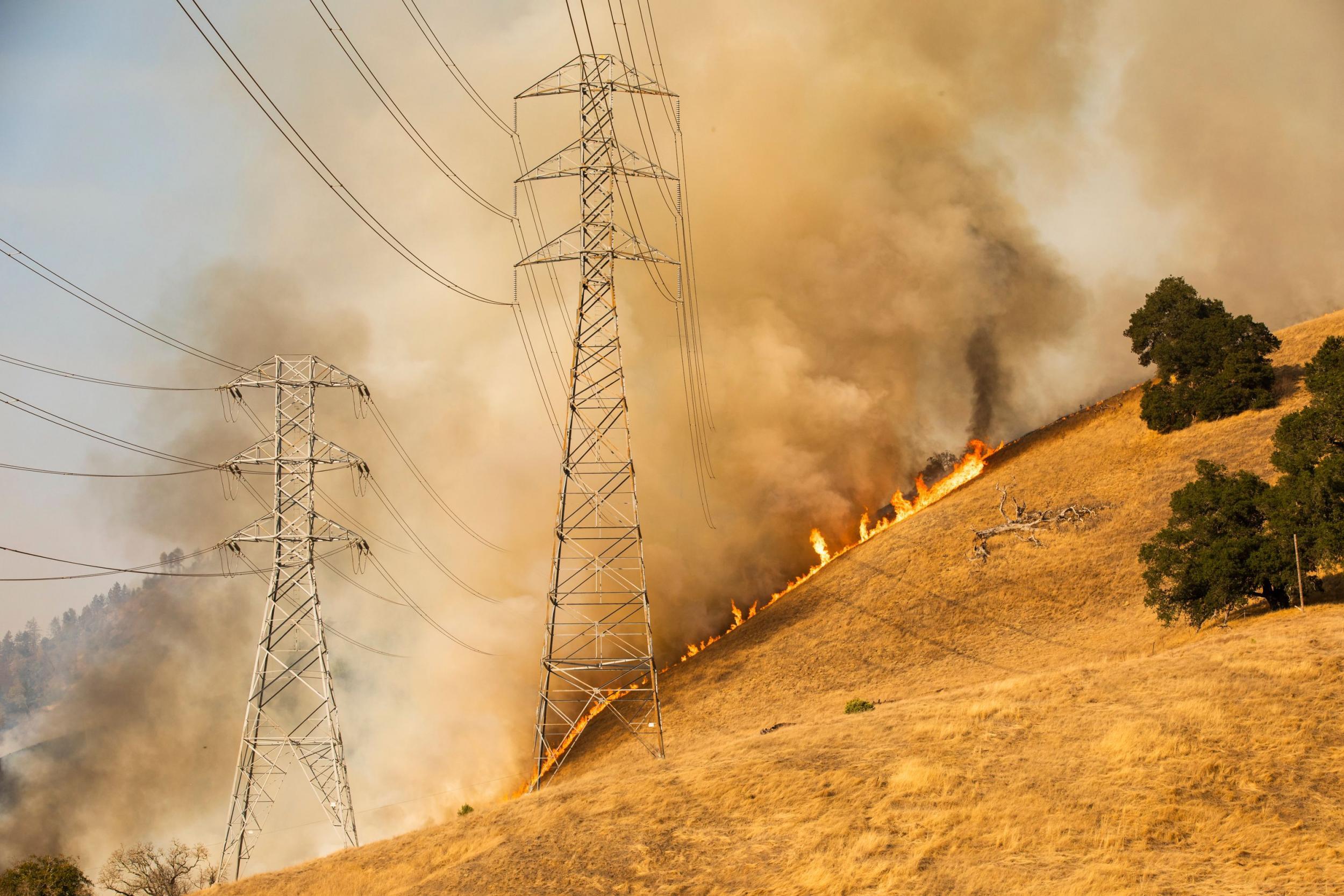 PG&amp;E is shutting off parts of the power network to try to stop the fire from spreading