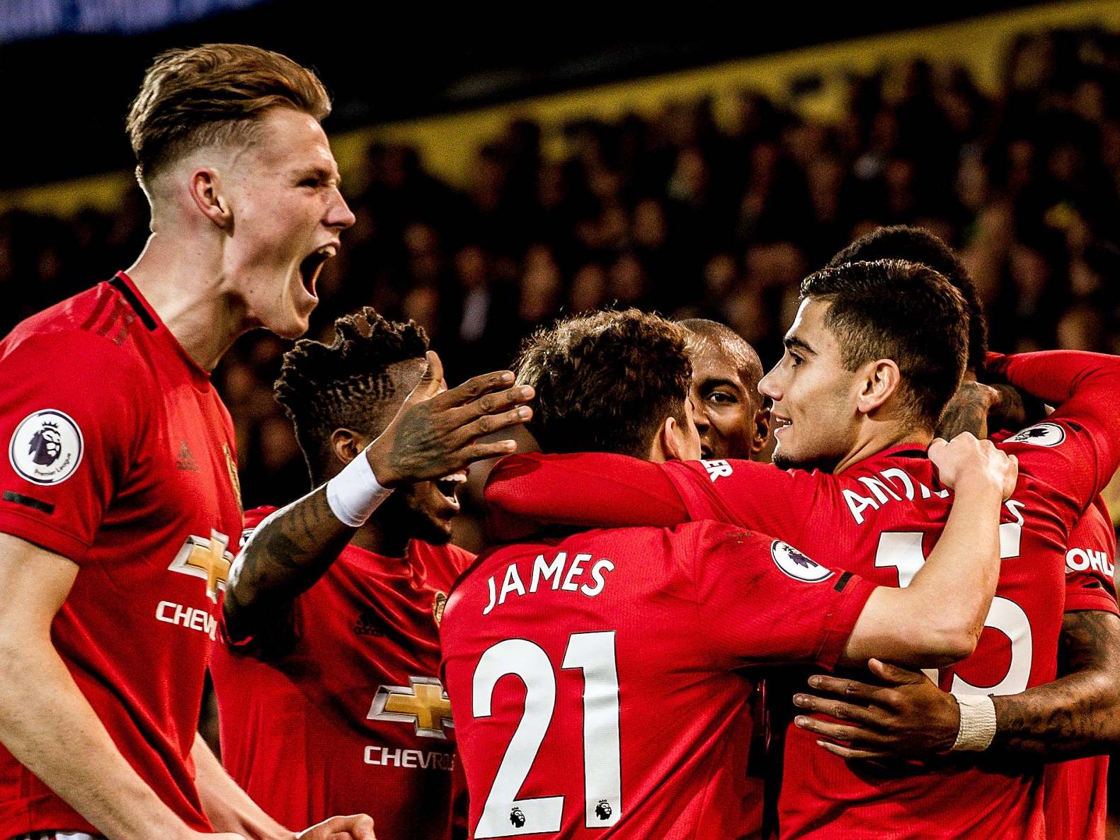 United celebrate at Carrow Road