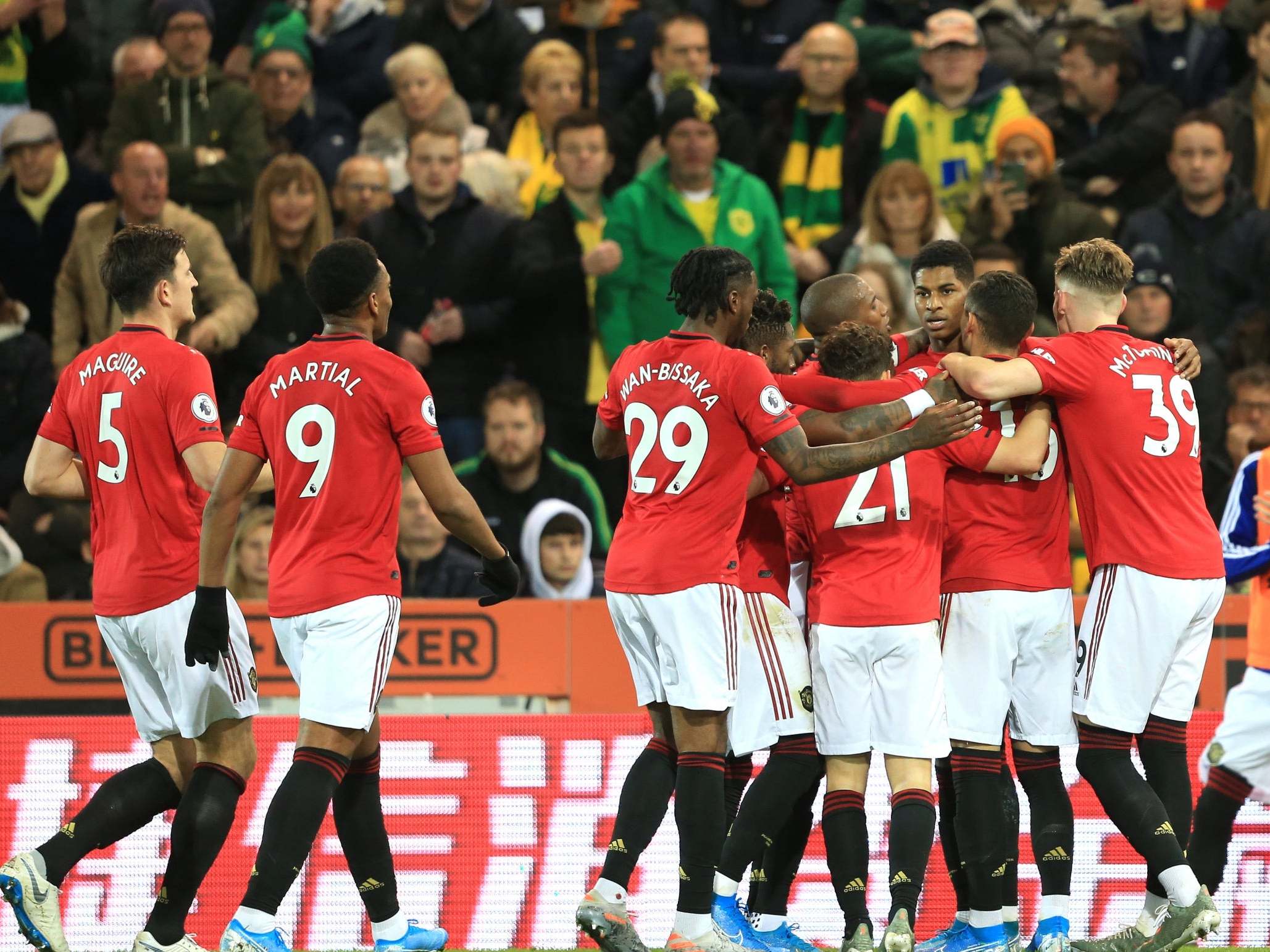 Man United celebrate their win at Norwich