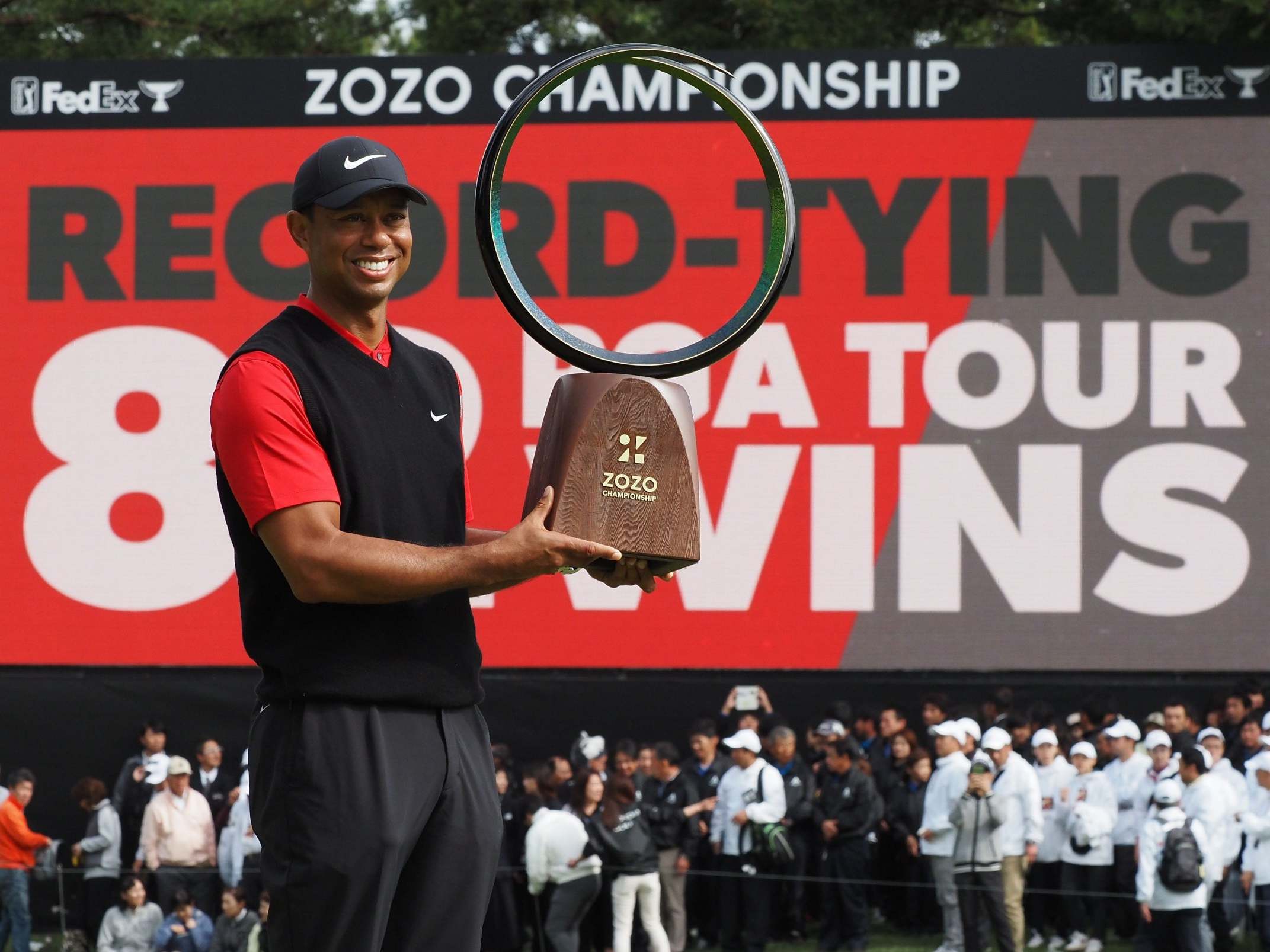 Tiger Woods celebrates his 82nd victory on the PGA Tour