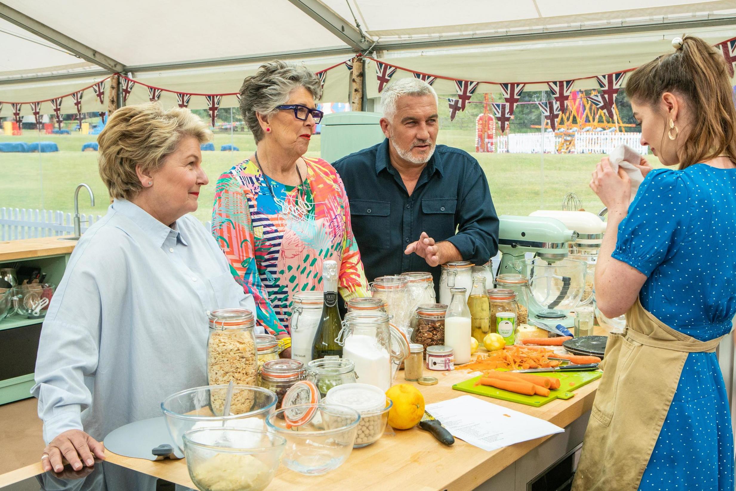 Sandi Toksvig, Prue Leith and Paul Hollywood chat with contestant Alice Fevronia during the Great British Bake Off final.