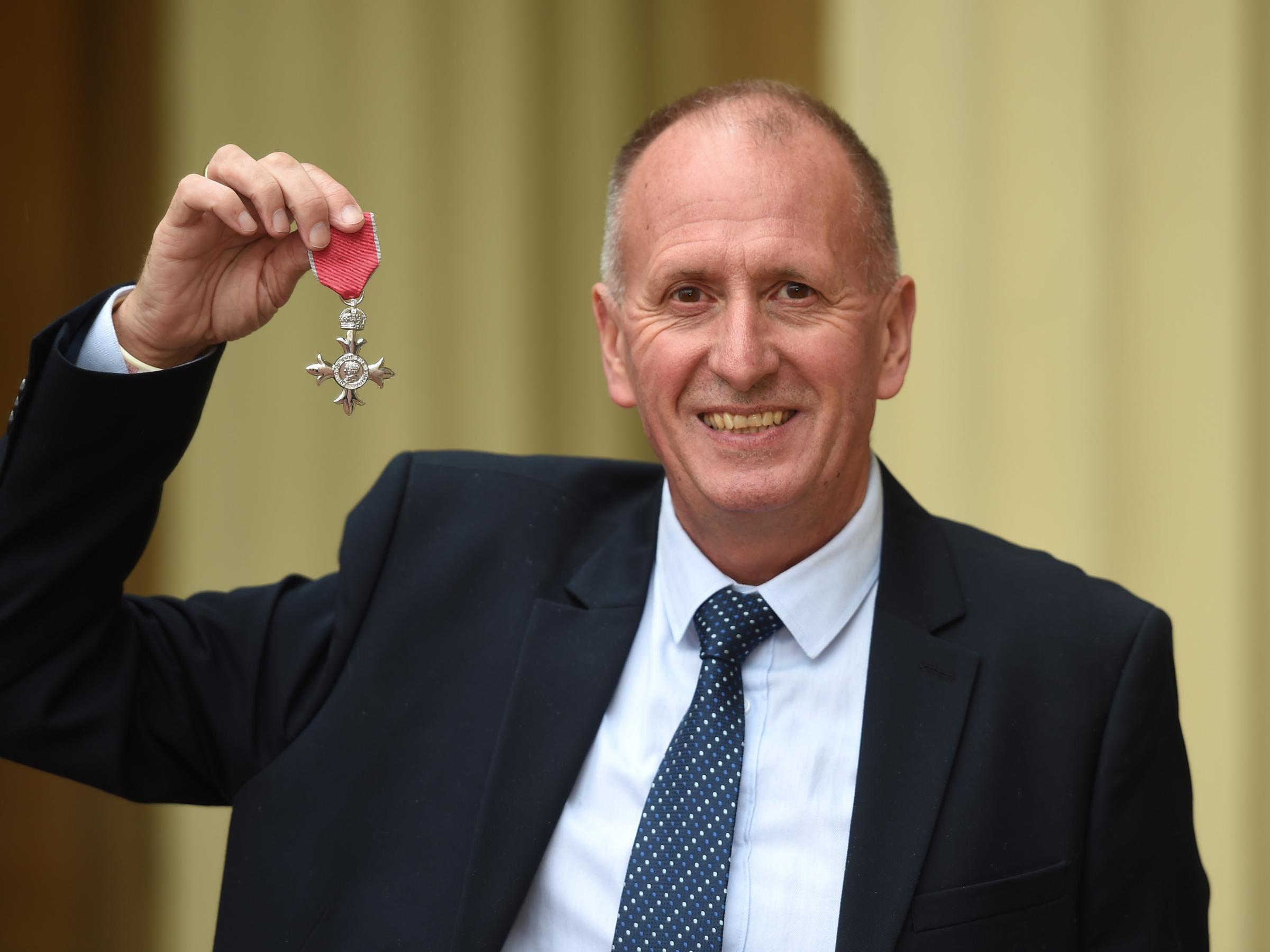 Vernon Unsworth with his MBE following an investiture ceremony at Buckingham Palace, in London, on 12 June, 2019.