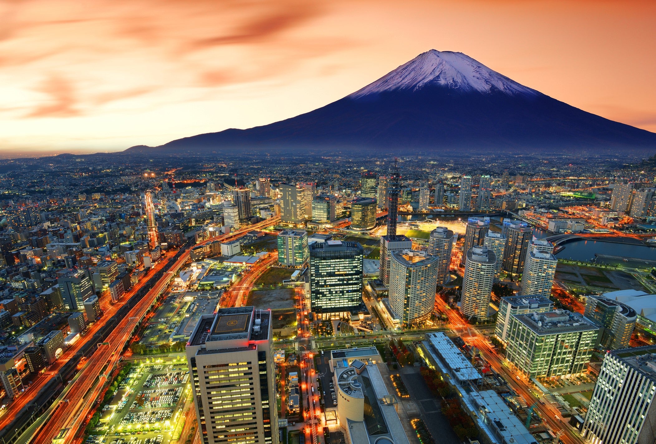 Mount Fuji looms in the background of Yokohama