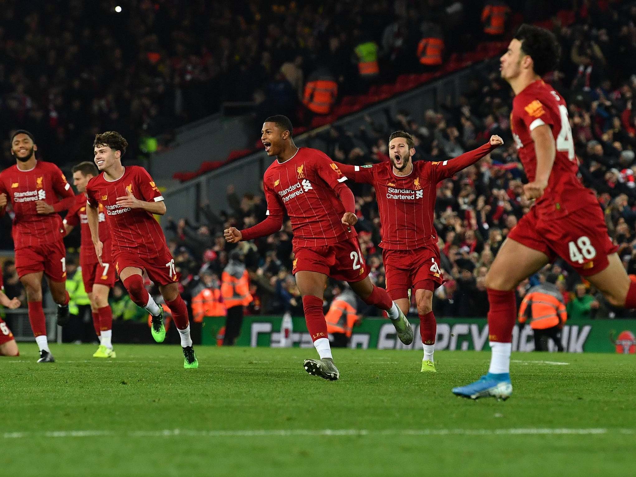 Curtis Jones celebrates his winning spot kick (Getty)