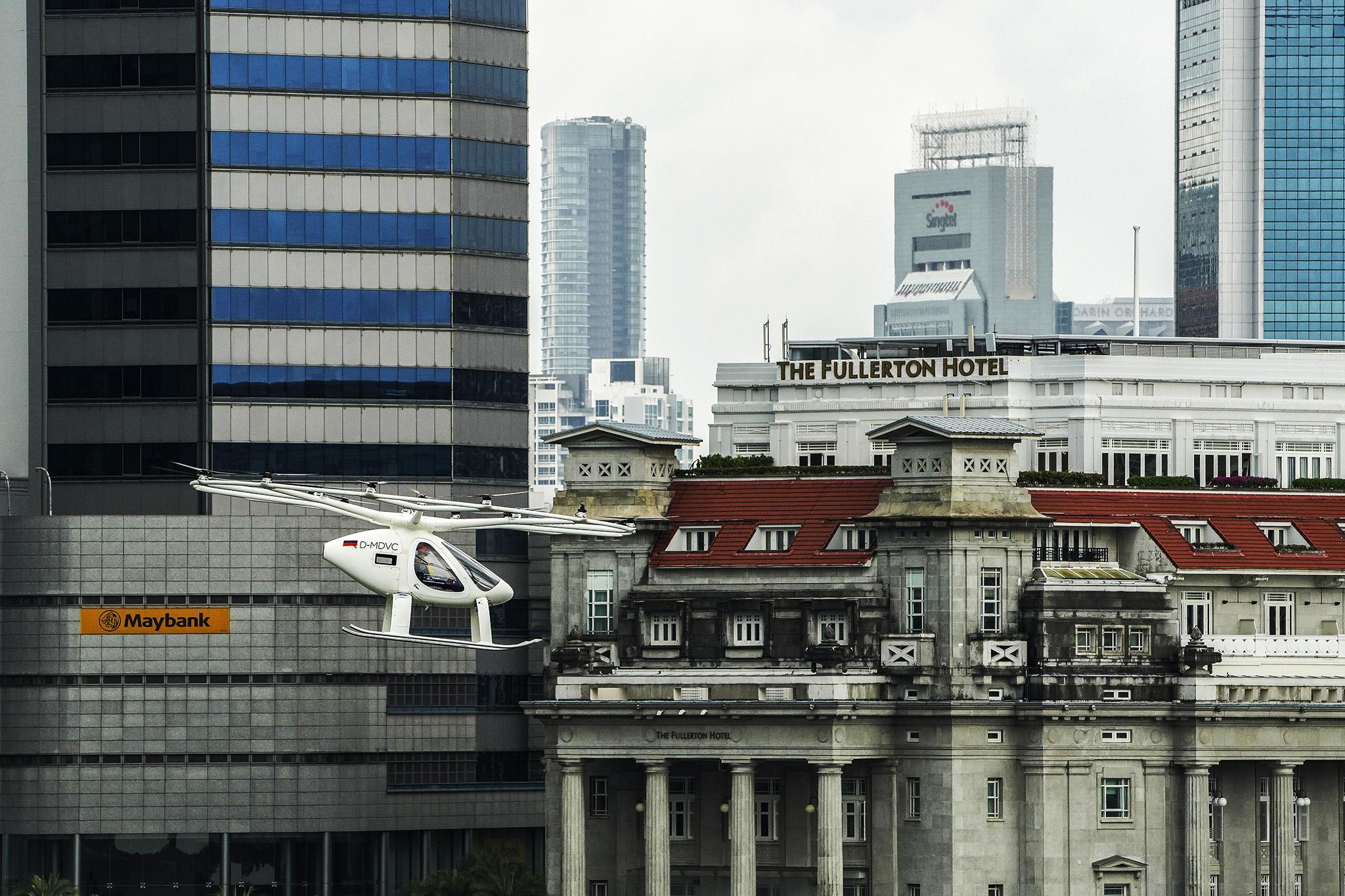 A prototype of the Volocopter air taxi during a test flight over Marina Bay, Singapore in October