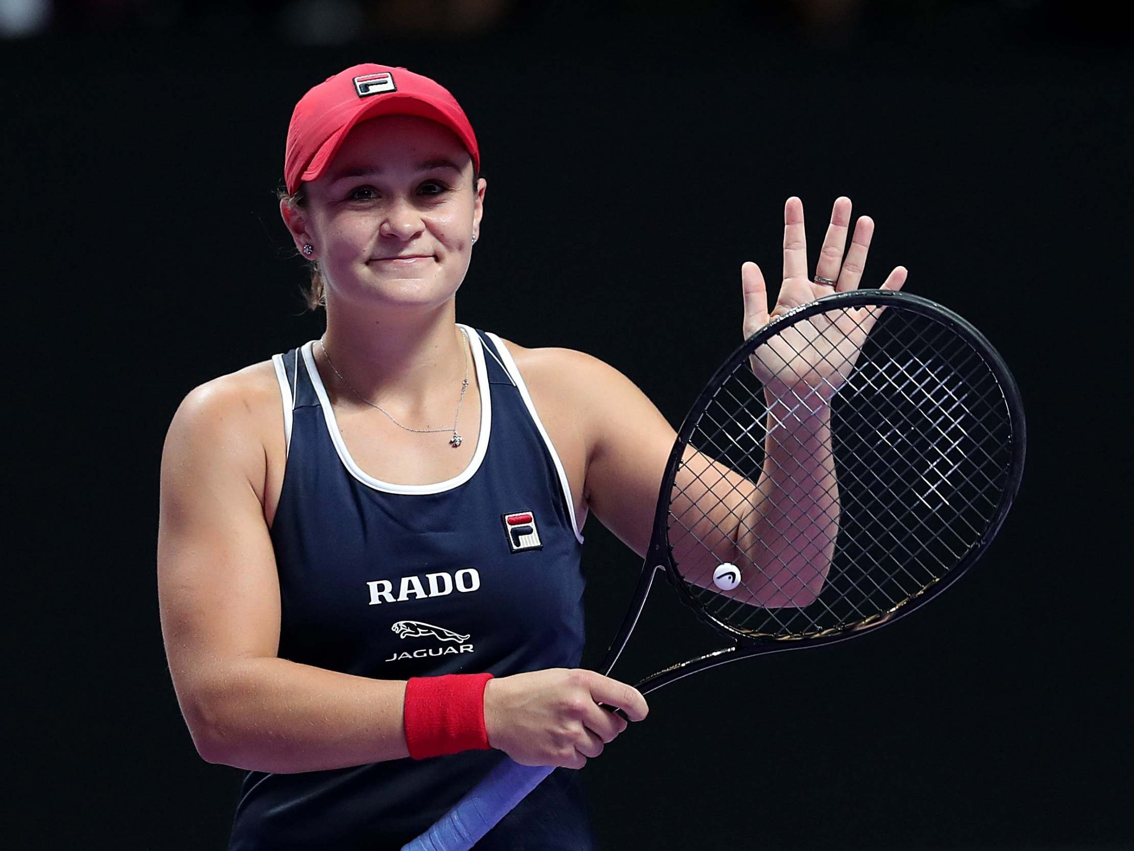 Ashleigh Barty celebrates defeating Petra Kvitova