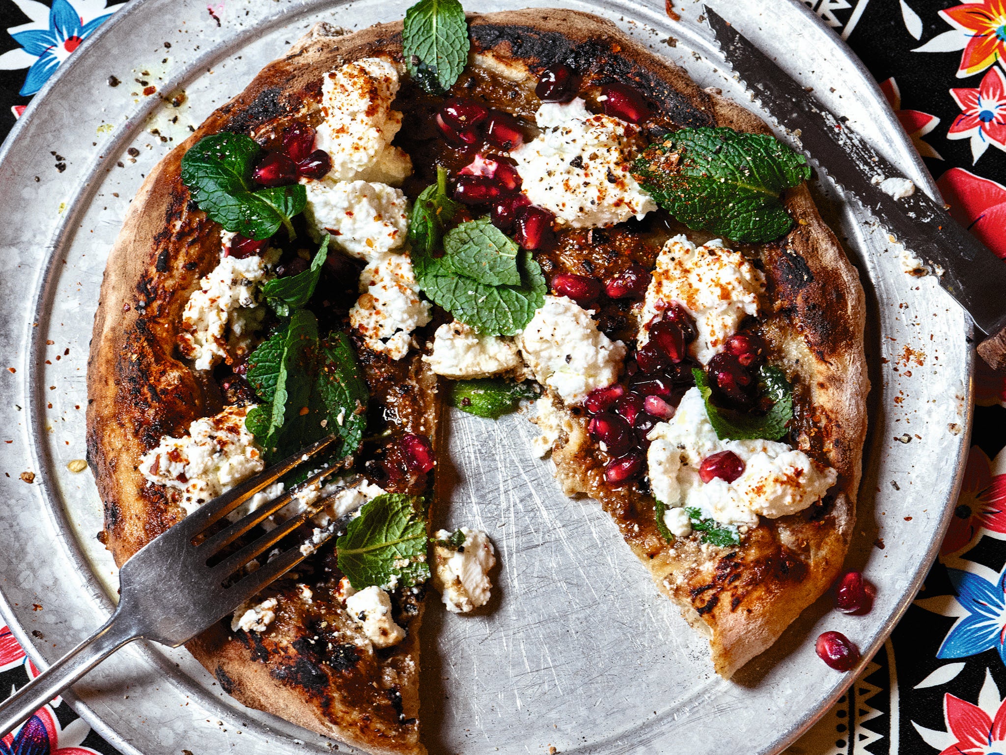 Flatbreads are a signature here, with a Middle Eastern influence too